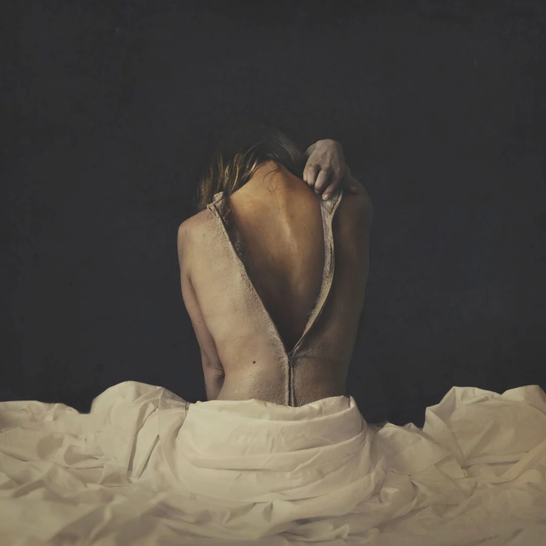 A finalist in the Altered Images category. Moth shows a woman removing her second skin to reveal her true self, in the process turning from something cold, pale and withered into something that looks much younger and more vital. We wish we could do the same