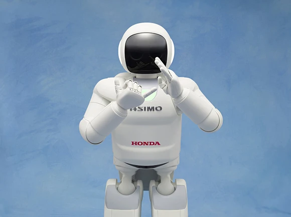 ASIMO making the Japanese sign language symbol for "family"