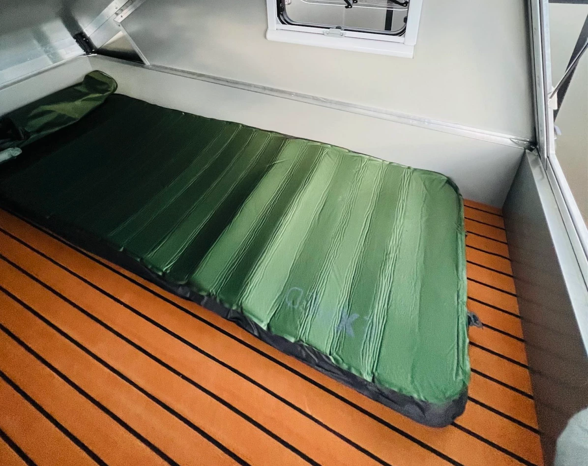 The RTD includes a large floor fit for a double mattress (or separate sleeping pads)