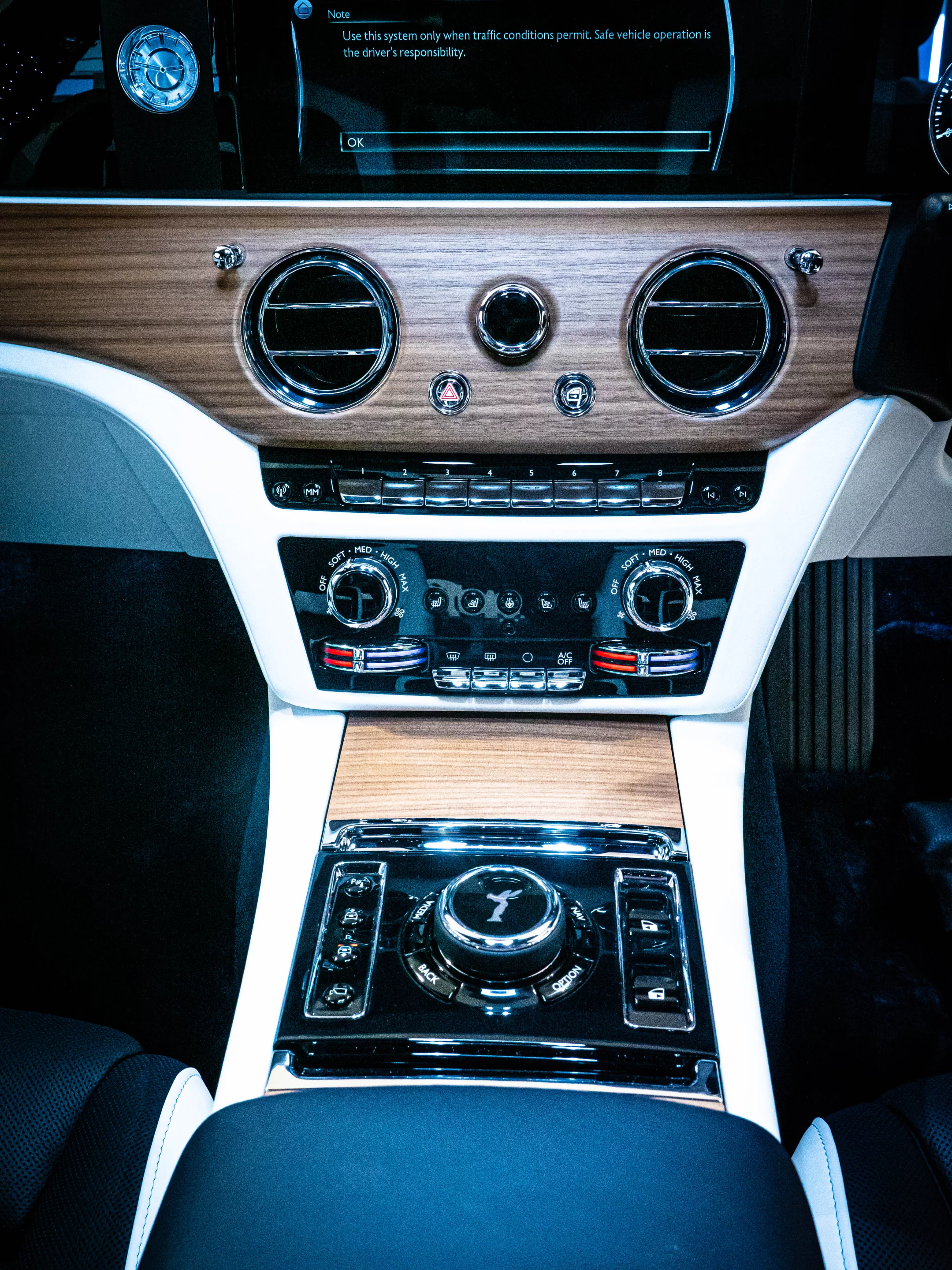 Center console includes a "spirit of ecstasy" dial that you can write on with your finger