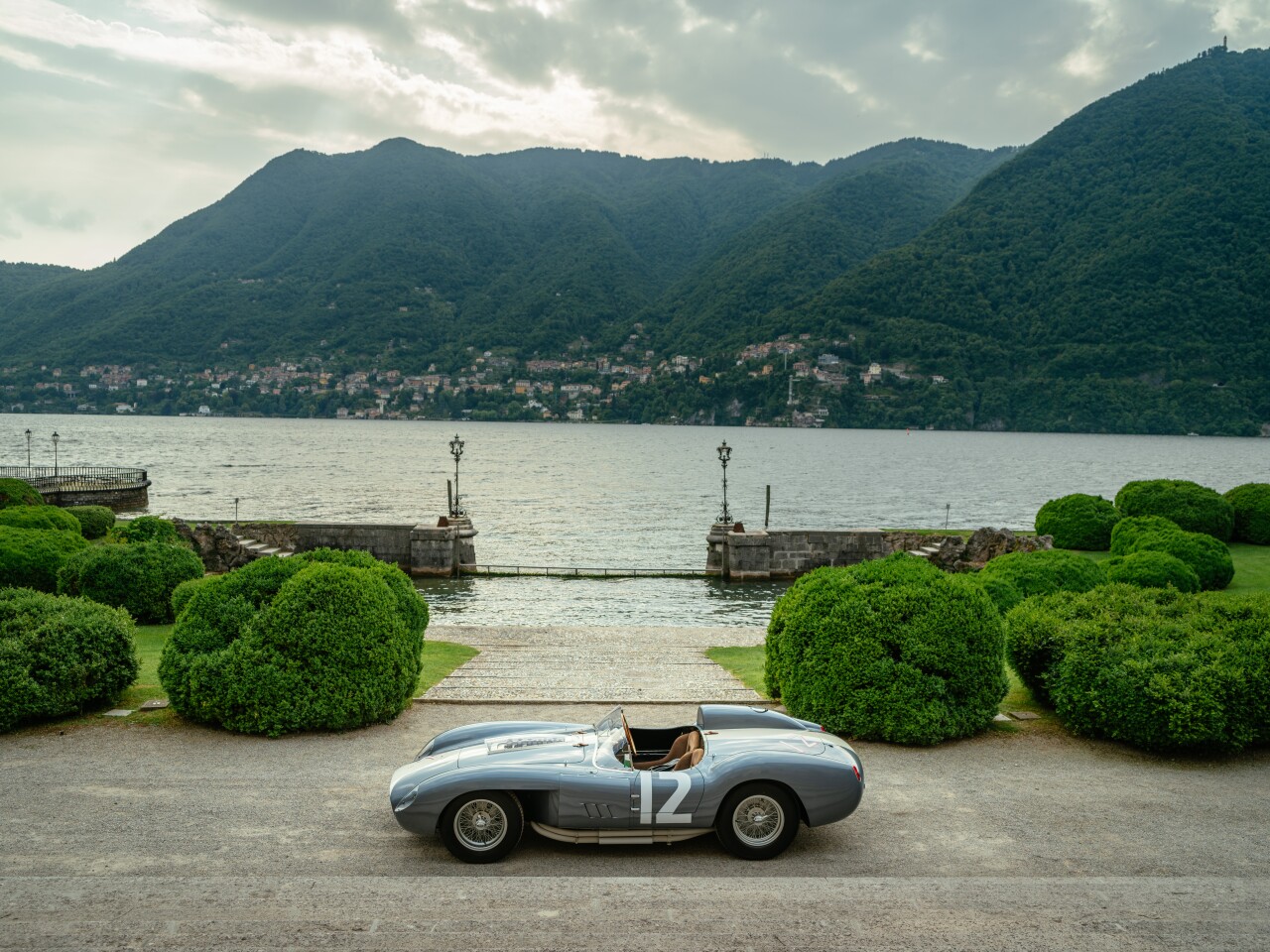 1958 Ferrari 335 S Spyder by Scaglietti | Winner: 2018 Concorso d'Eleganza Villa d'Este | Owner: Andreas Mohringer, Austria | Specifications: 4023 cc, DOHC V12 engine • 5-speed manual transaxle • 390 horsepower at 7400 rpm • Independent suspension front, De Dion real axle • Four-wheel hydraulic drum brakes