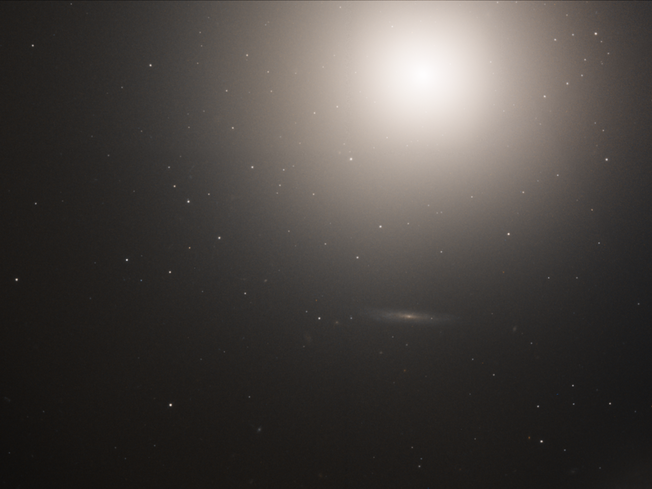 An image of the elliptical galaxy M89, created from near-infrared and visible light observations made by the Hubble space telescope