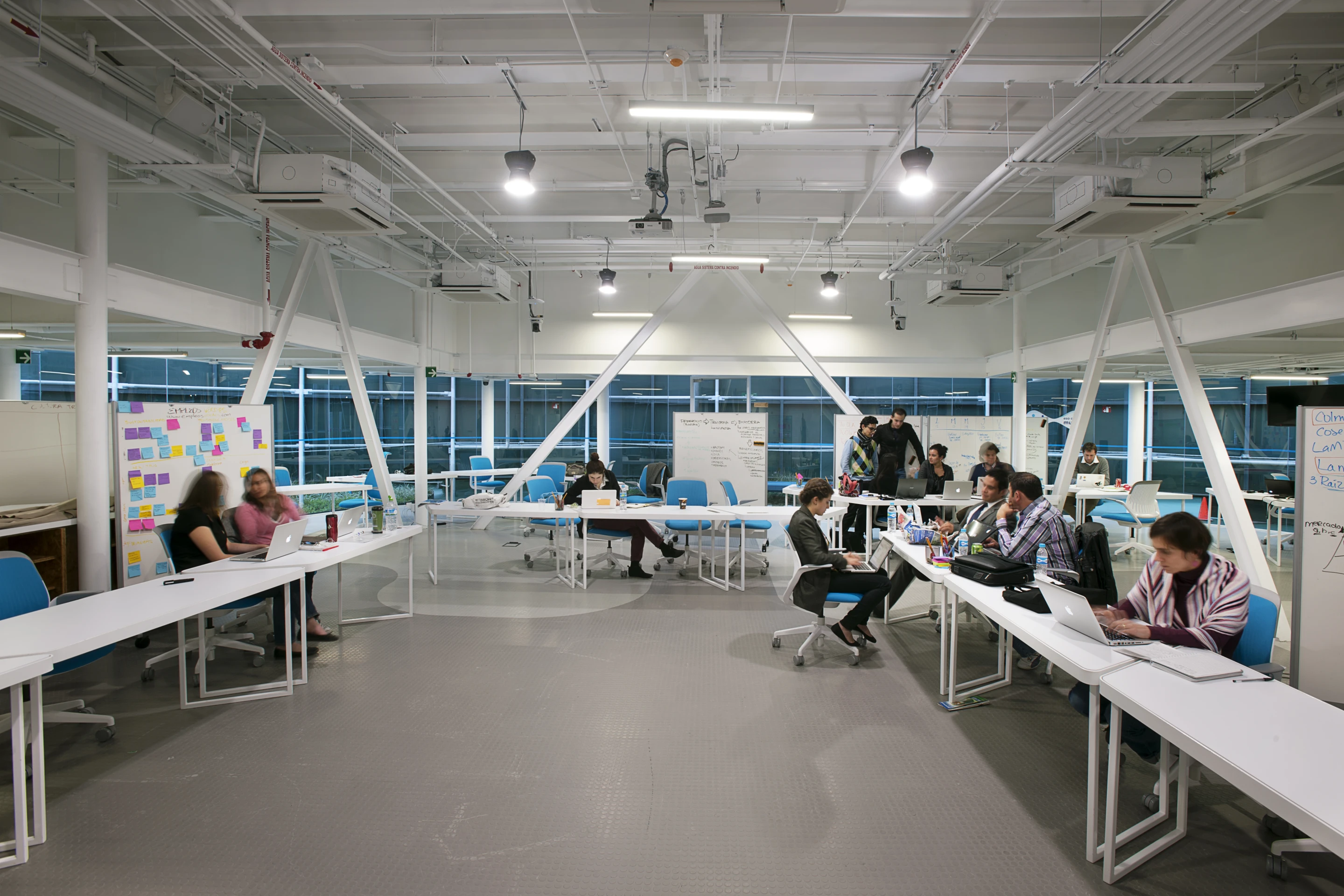 The designers built an open office space filled with locally-made furniture that's designed to be easily rearranged into different configurations (Credit: Jaime Navarro; Courtesy Rojkind Arquitectos)