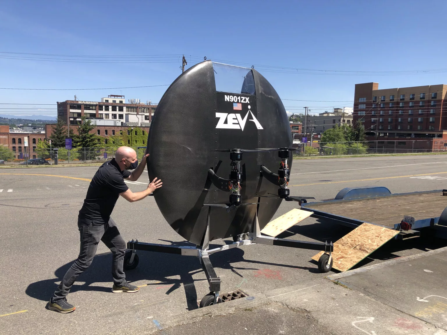 A Zeva team member unloading the prototype from a trailer