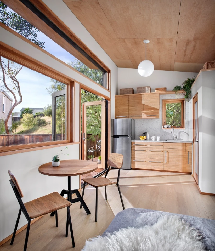 The interior is finished in high-end materials, like solid fir, Caesarstone counters, solid bamboo and maple cabinetry, and oak flooring