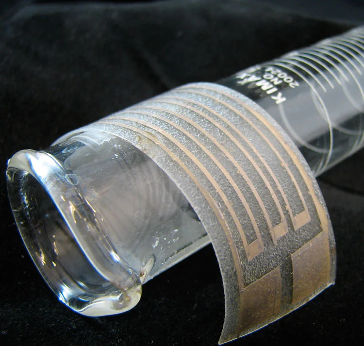 The particle-free silver ink is here applied to a thin, stretchy plastic film to make a flexible silver electrode