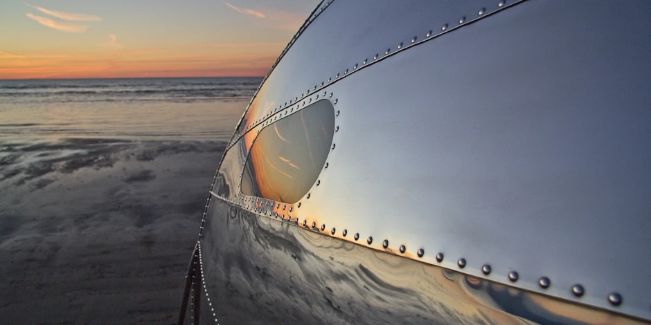 The Bowlus Road Chief has a monocoque shell made of polished aircraft-grade aluminum over an aluminum frame held together by over 5,000 rivets