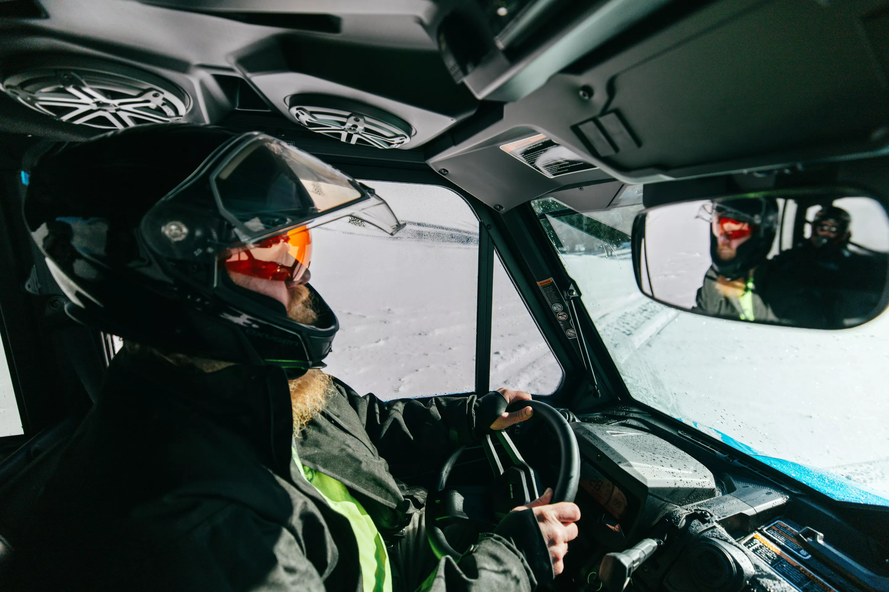 On the trail, with others in the vehicle, the author attempts to appear professional