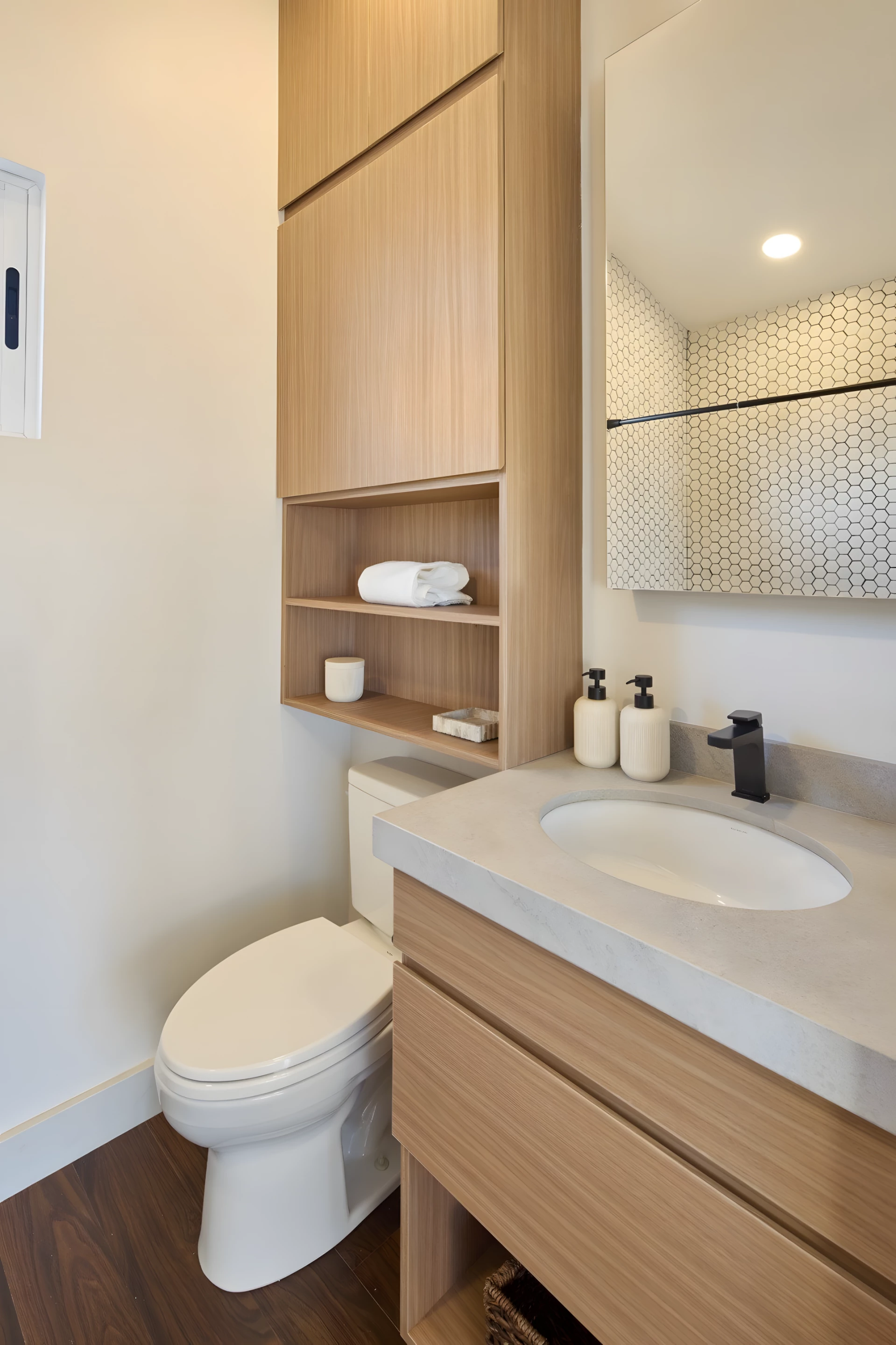 The Vettel Haus' bathroom also has a vanity sink and flushing toilet, plus some more storage