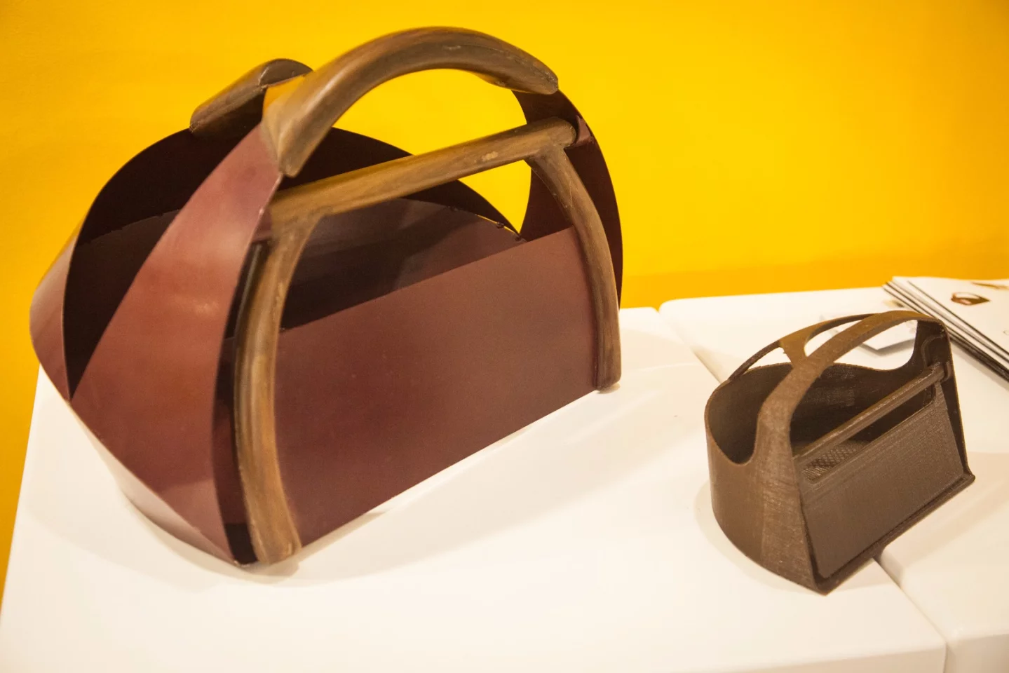 The Gomi dung-collection device uses a scraper and basket to collect the dung in a similar way to a dust pan and broom, making for more hygienic practice than using one's hands while preserving Indian tradition. By Anmol Gupta from the Pearl Academy in New Delhi