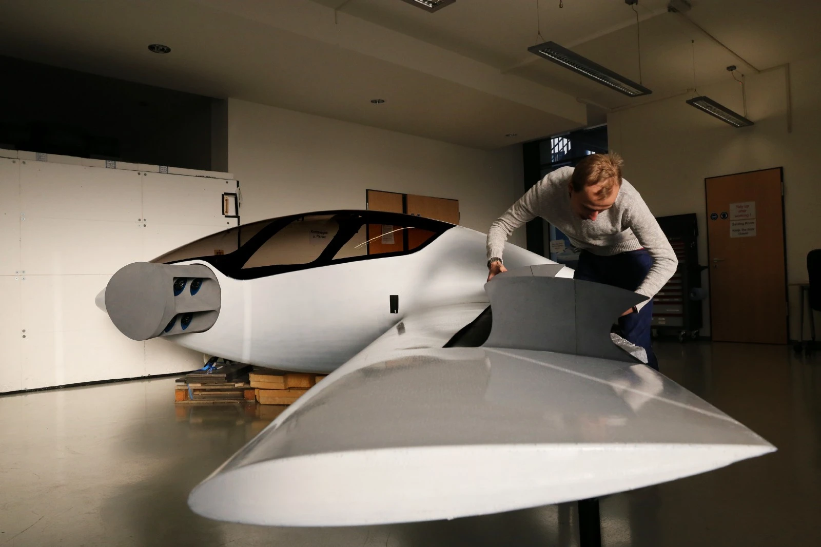 Working on the prototype's wing