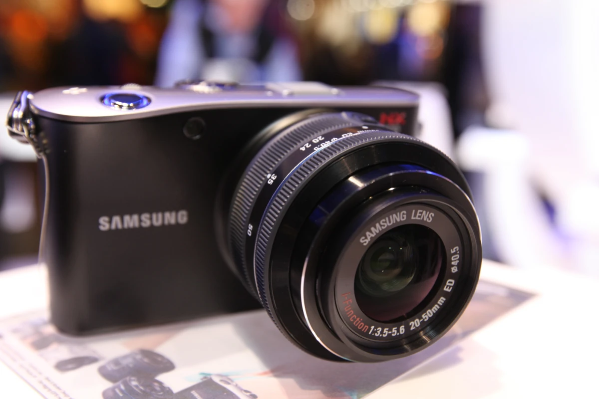 i-Function lens technology featured on the NX100 (pictured) is now compatible with Samsung's NX10
