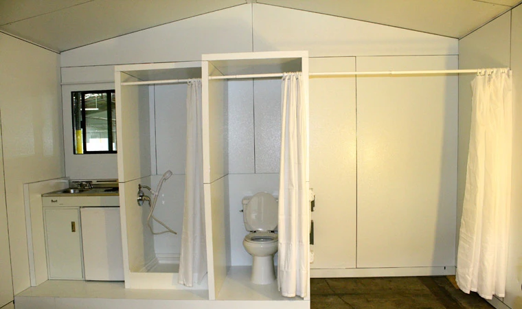 Each QuickHab is equipped with a water heater, shower, toilet and kitchenette