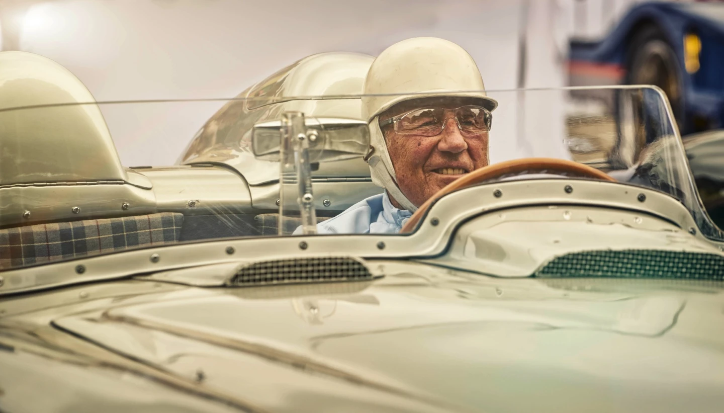 It's 60 years since Sir Sterling Moss drove this car at 100 mph for ten hours to win the Mille Miglia, but the look on his face says it all