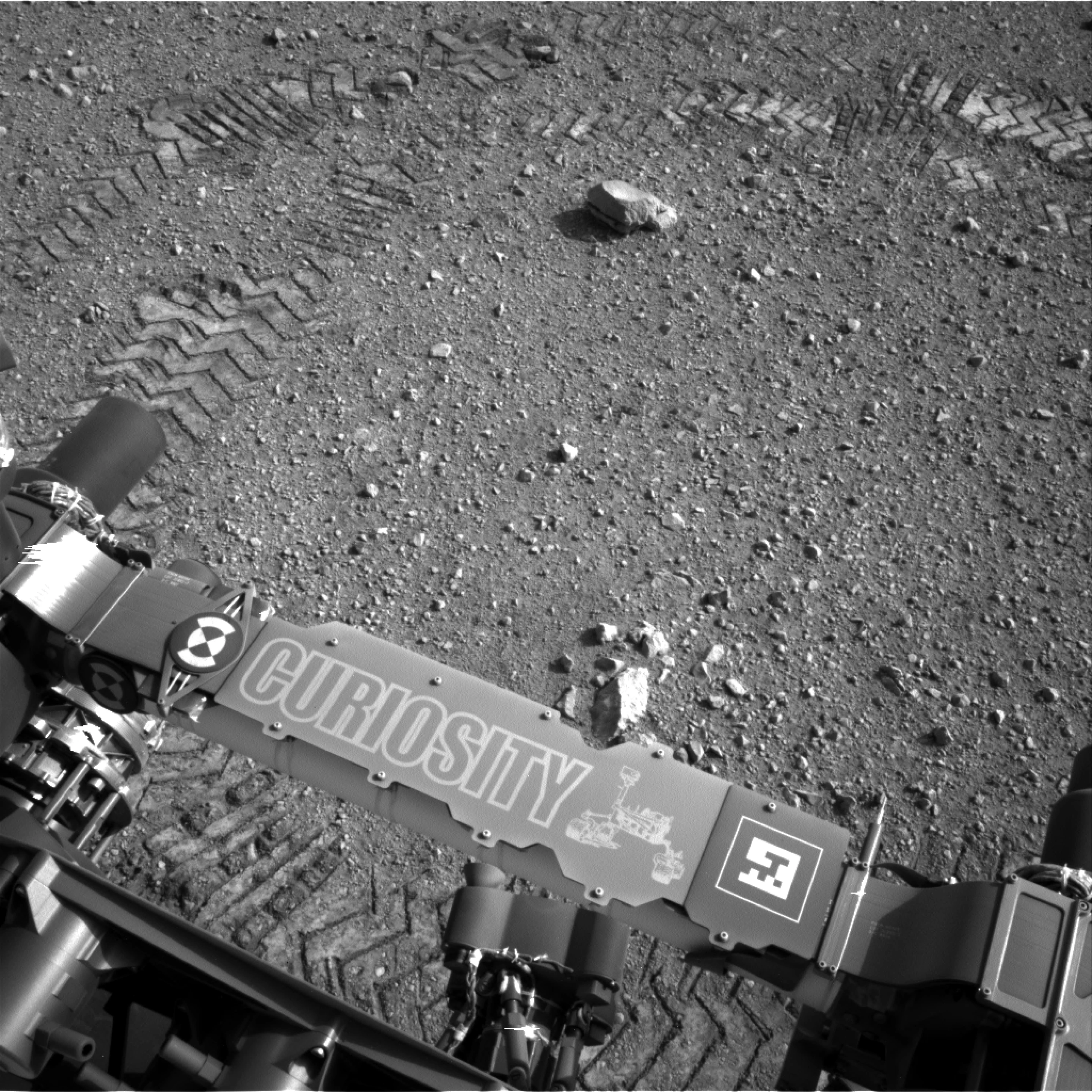 Curiosity rolls out, and writes a message on Mars