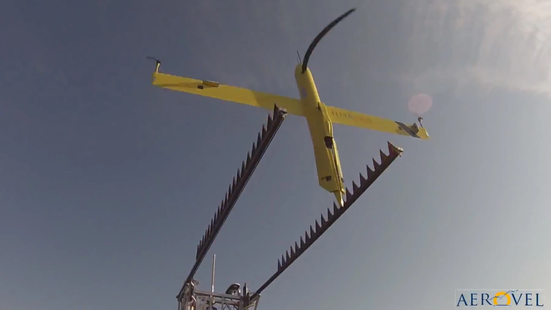 The Flexrotor taking off for its second flight after refueling - the propeller appears bent due to the camera's rolling shutter
