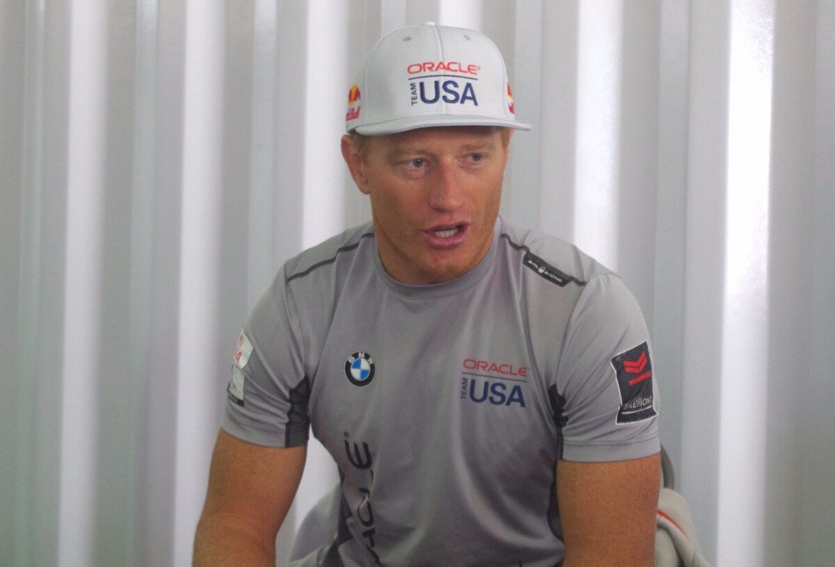 Oracle Team USA skipper Jimmy Spithill chatting with press at Oracle Team USA's canteen in Bermuda