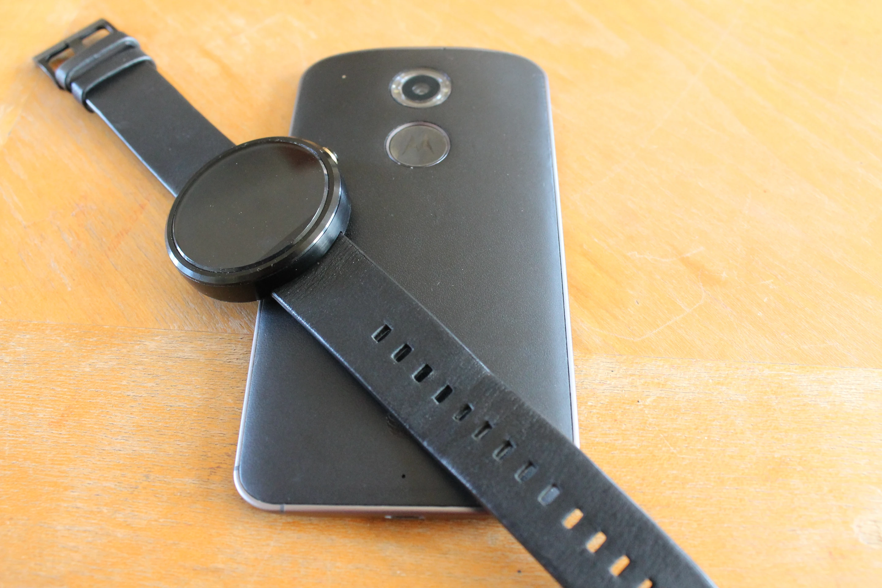 The Moto 360 and new Moto X (2014) (Photo credit: Eric Mack/Gizmag.com)