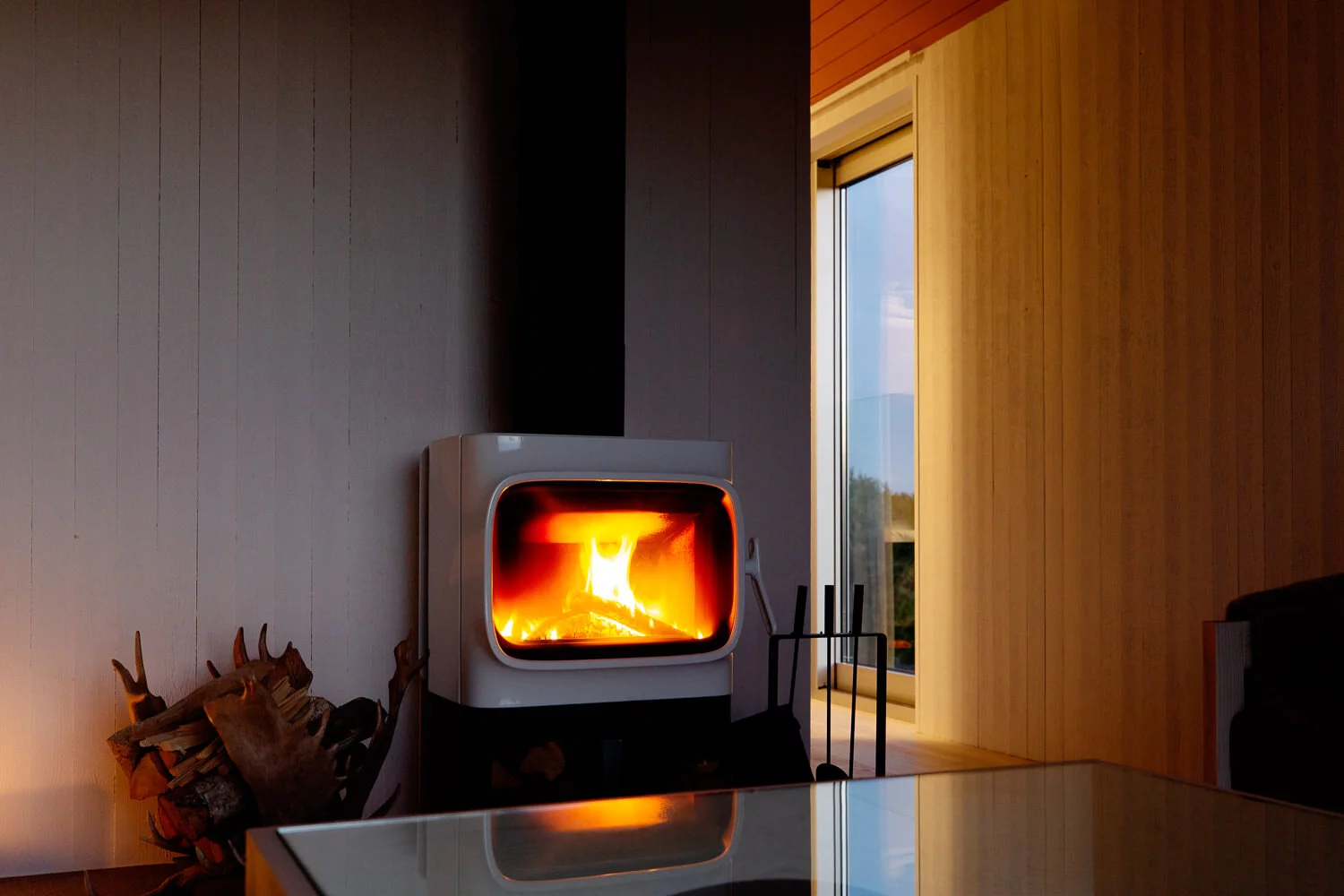 A wood-burning stove keeps the SynVillan's interior warm