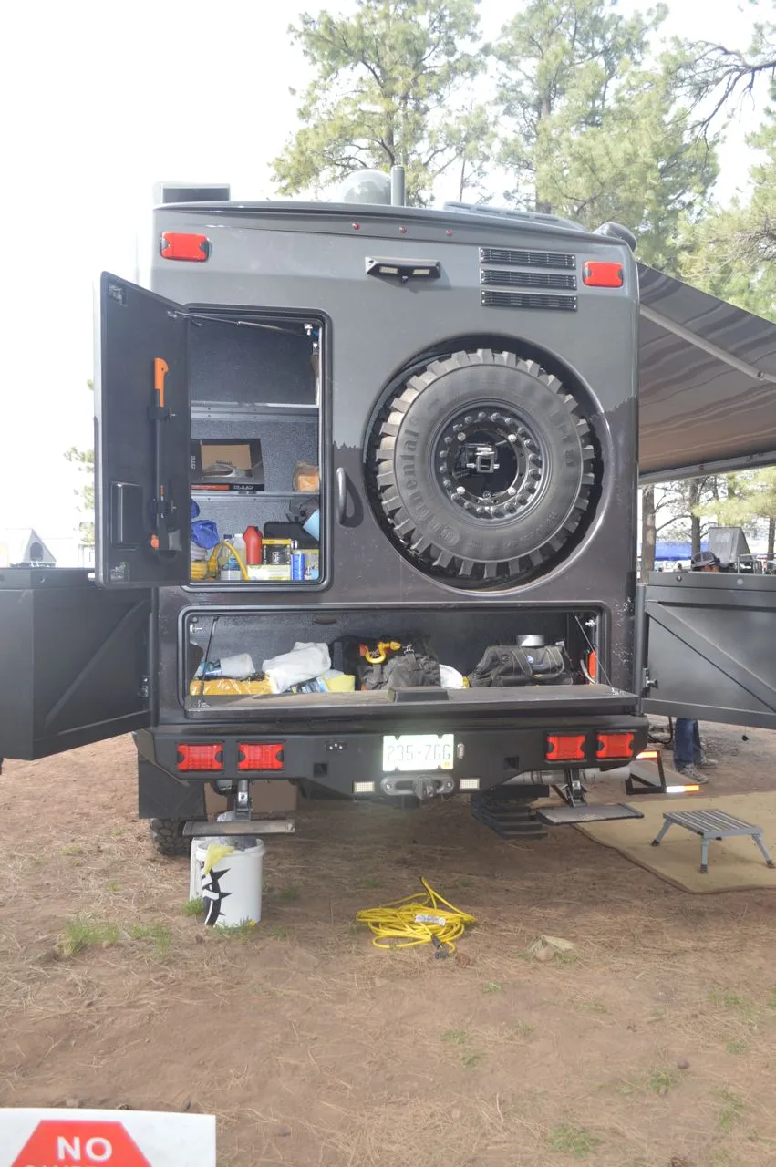EarthRoamer says the 2014 frame was extended and rear bumper redesigned around the storage boxes and rear winch access