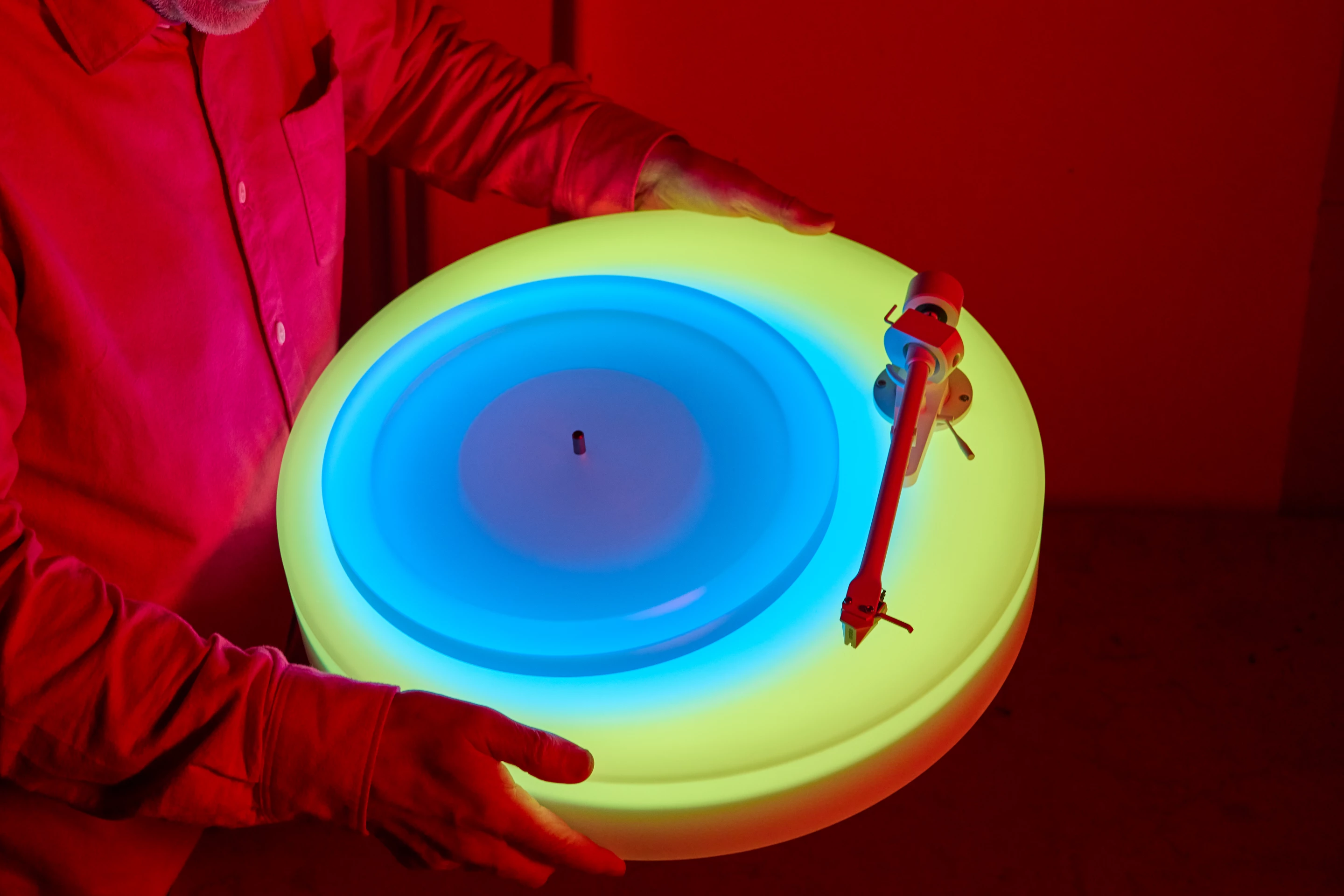 The Turntable II's base and platter are programmed to slowly change color to produce random "colorscapes"