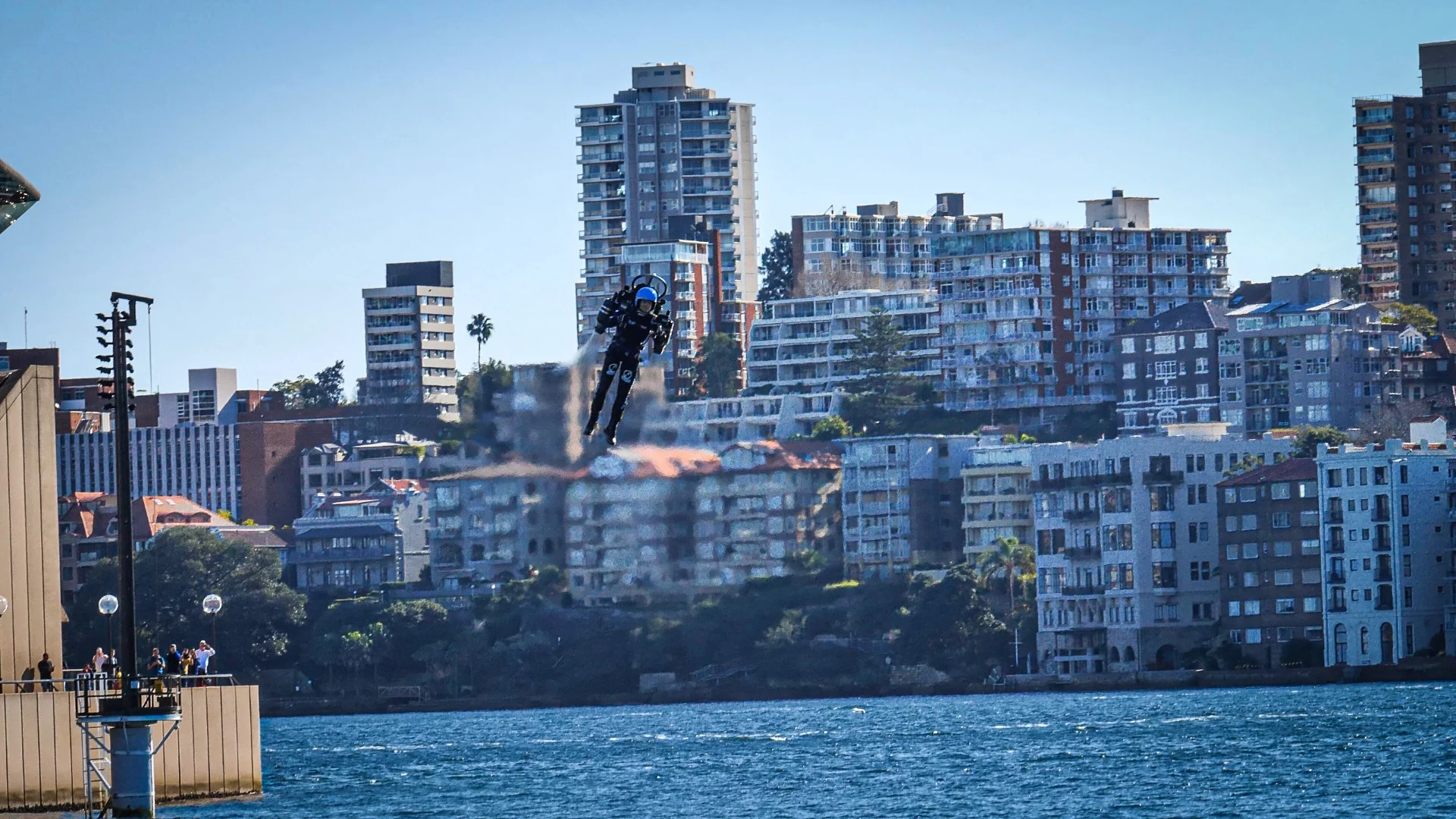The North Shore of Sydney Harbour makes a terrific background for Mayman as he rides his extraordinary creation