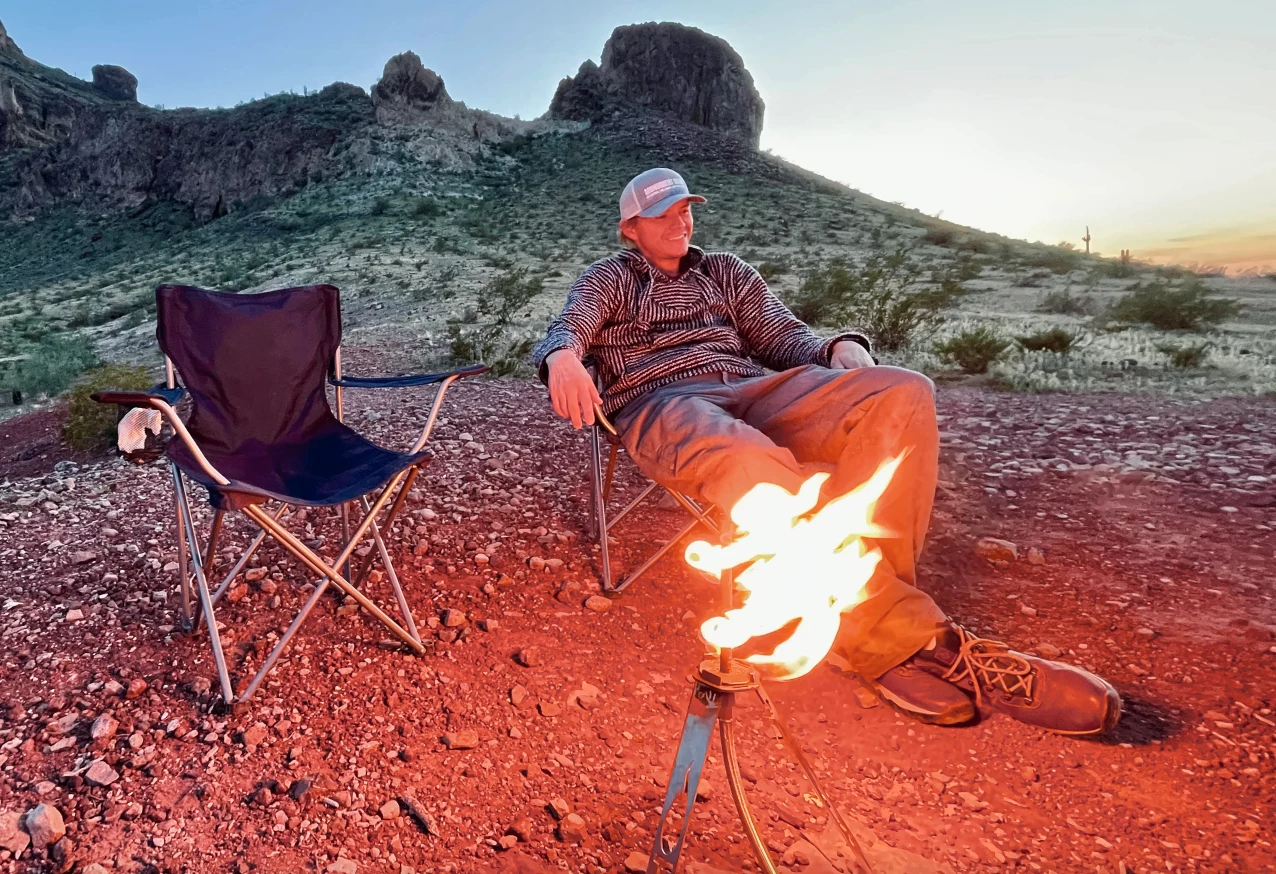 Enjoying the heat and flame show of the Tripod Torch