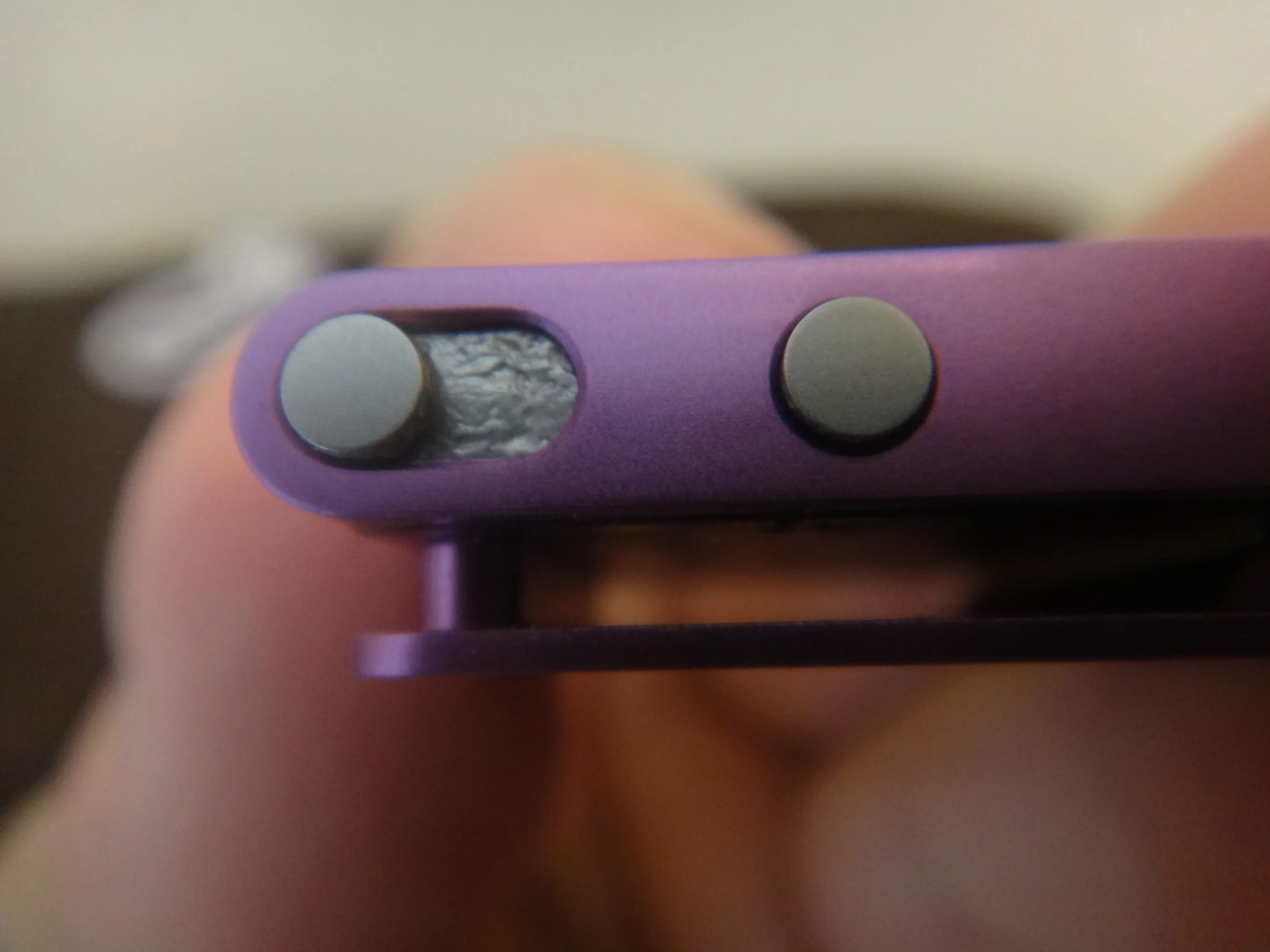 The only outward difference is some clear residue seeping out from the on/off switch and the seams around the clip on the back, but it's barely noticeable
