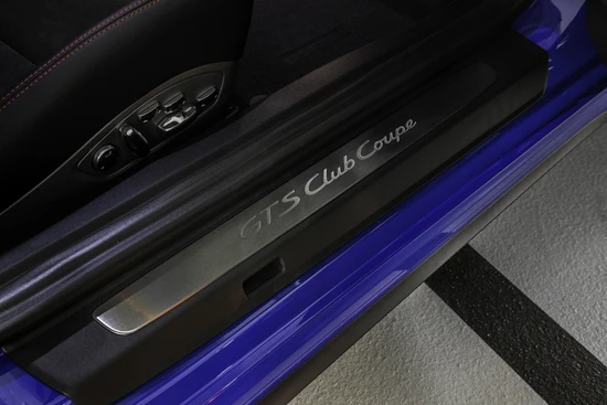 The doors are marked with black "Club Coupe" model designations, just in case you're forgetting you're driving something special