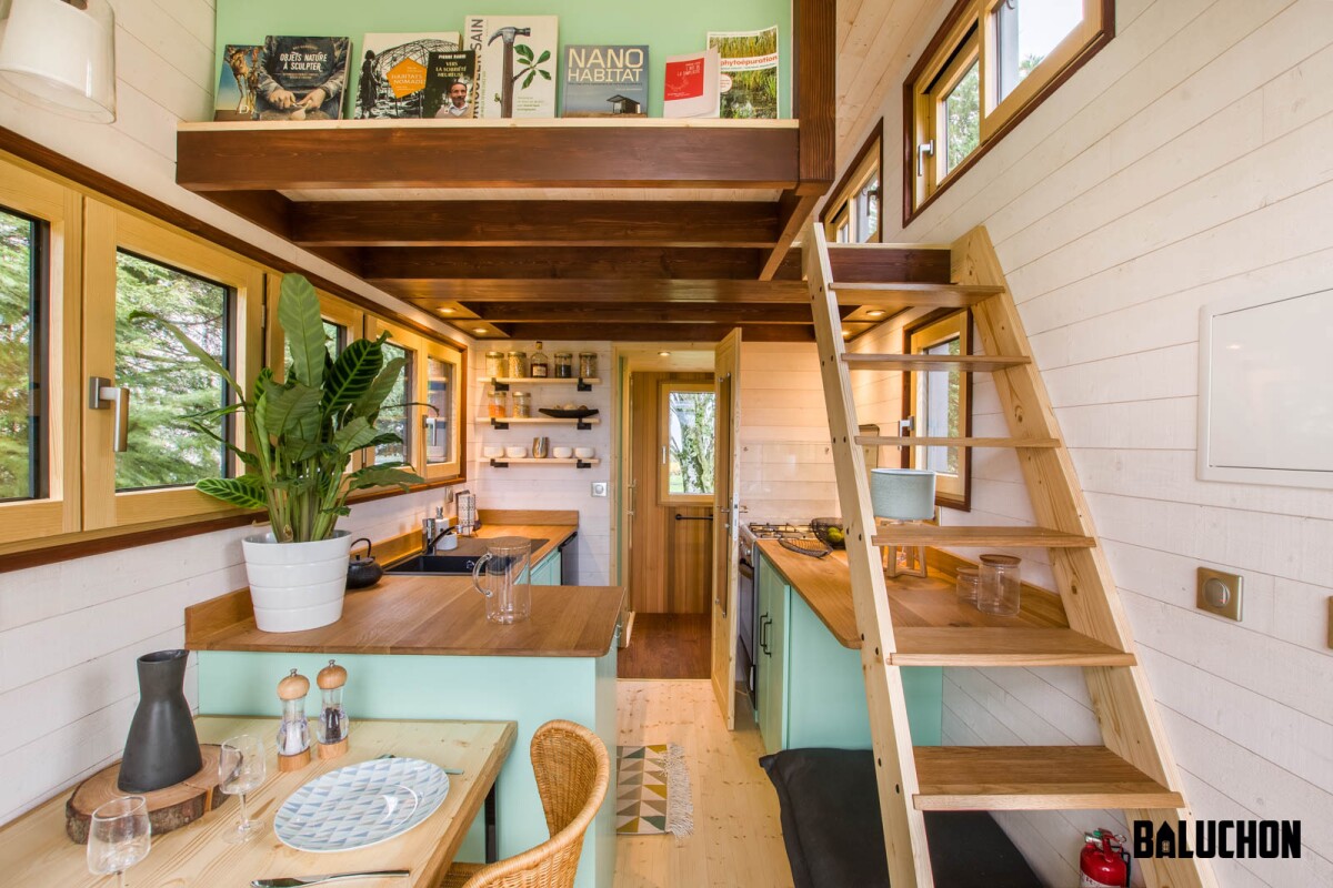Tiny house Le Château Ambulant's kitchen is relatively large and well-stocked by French standards