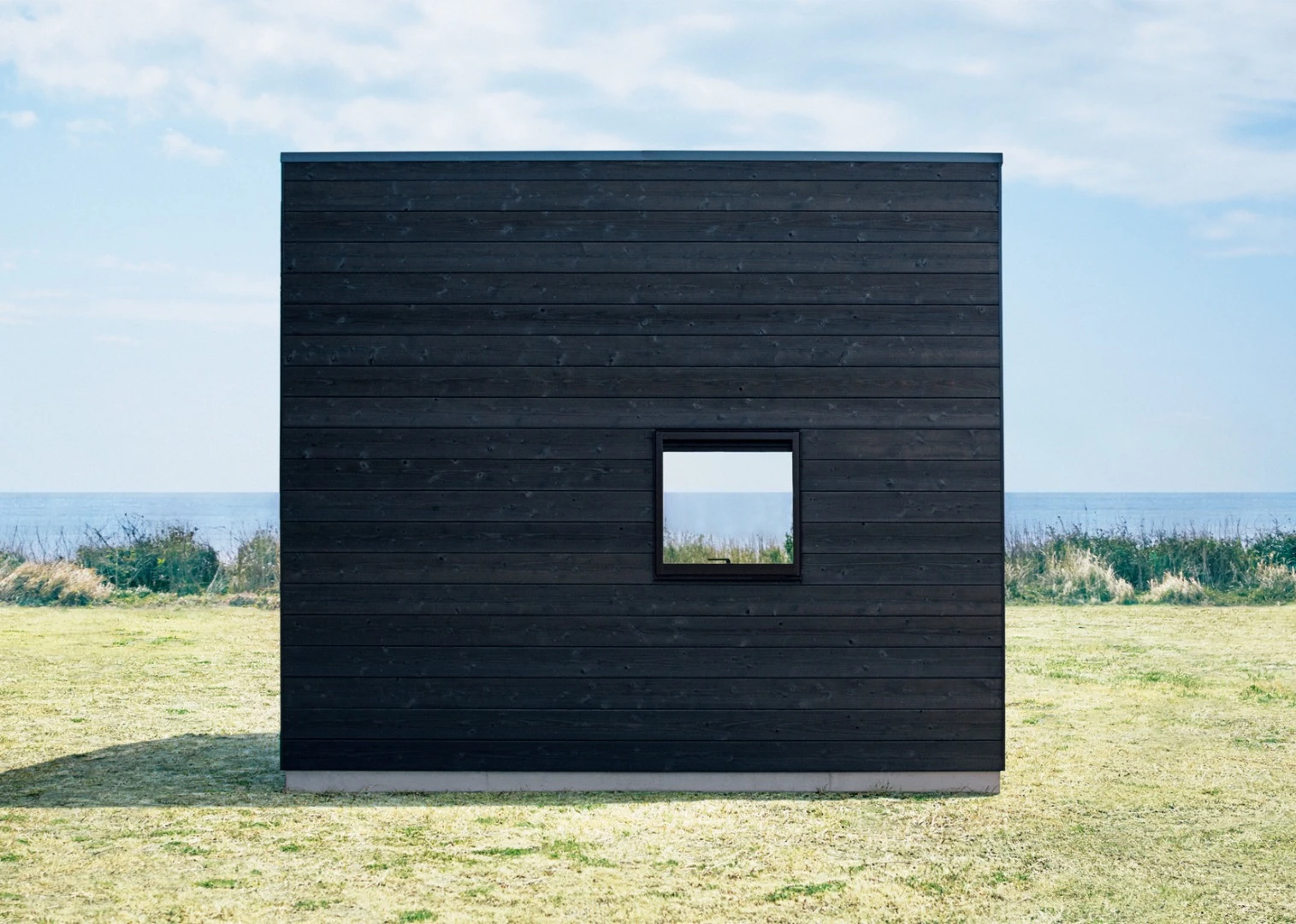 The Muji Hut's exterior is Shou Sugi Ban-treated cedar