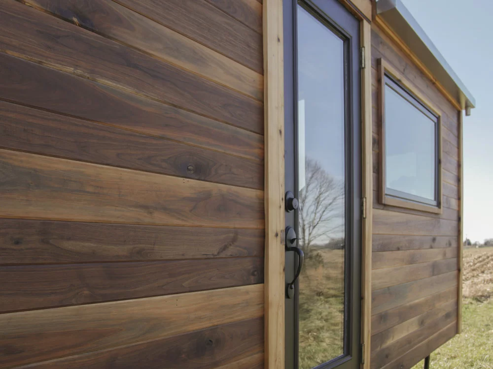 The Honey on the Rock is clad in walnut with cedar trim