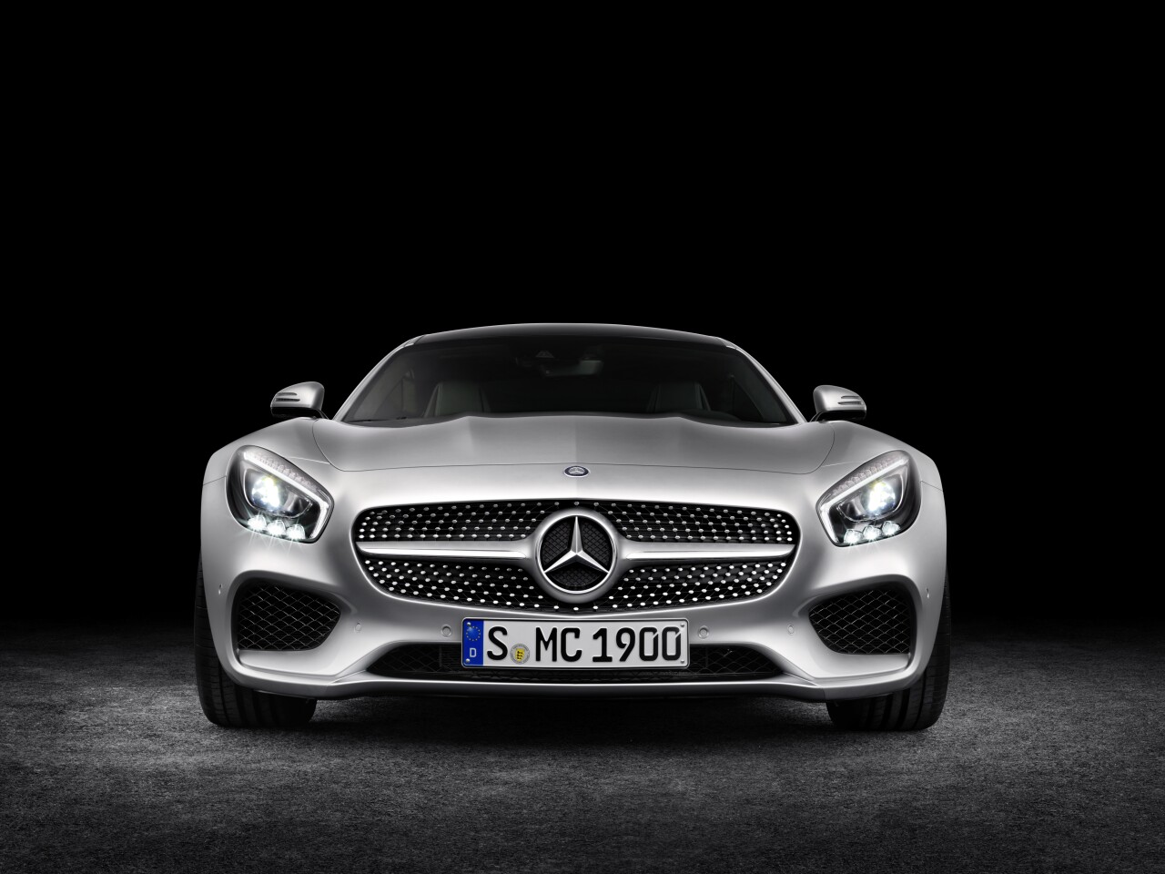 Up front, the car's wide air intakes grant it a great presence on the road