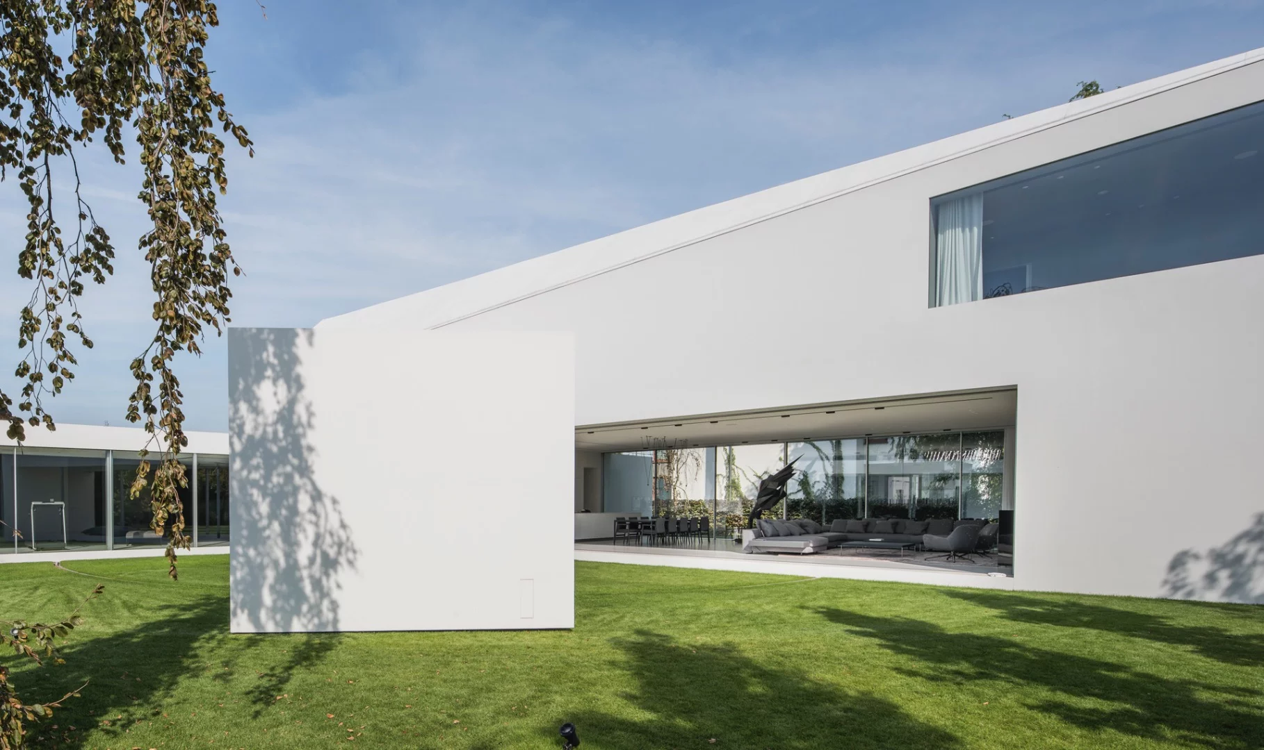 The front street-facing side of Quadrant House has no windows but the side that faces the garden has generous glazing