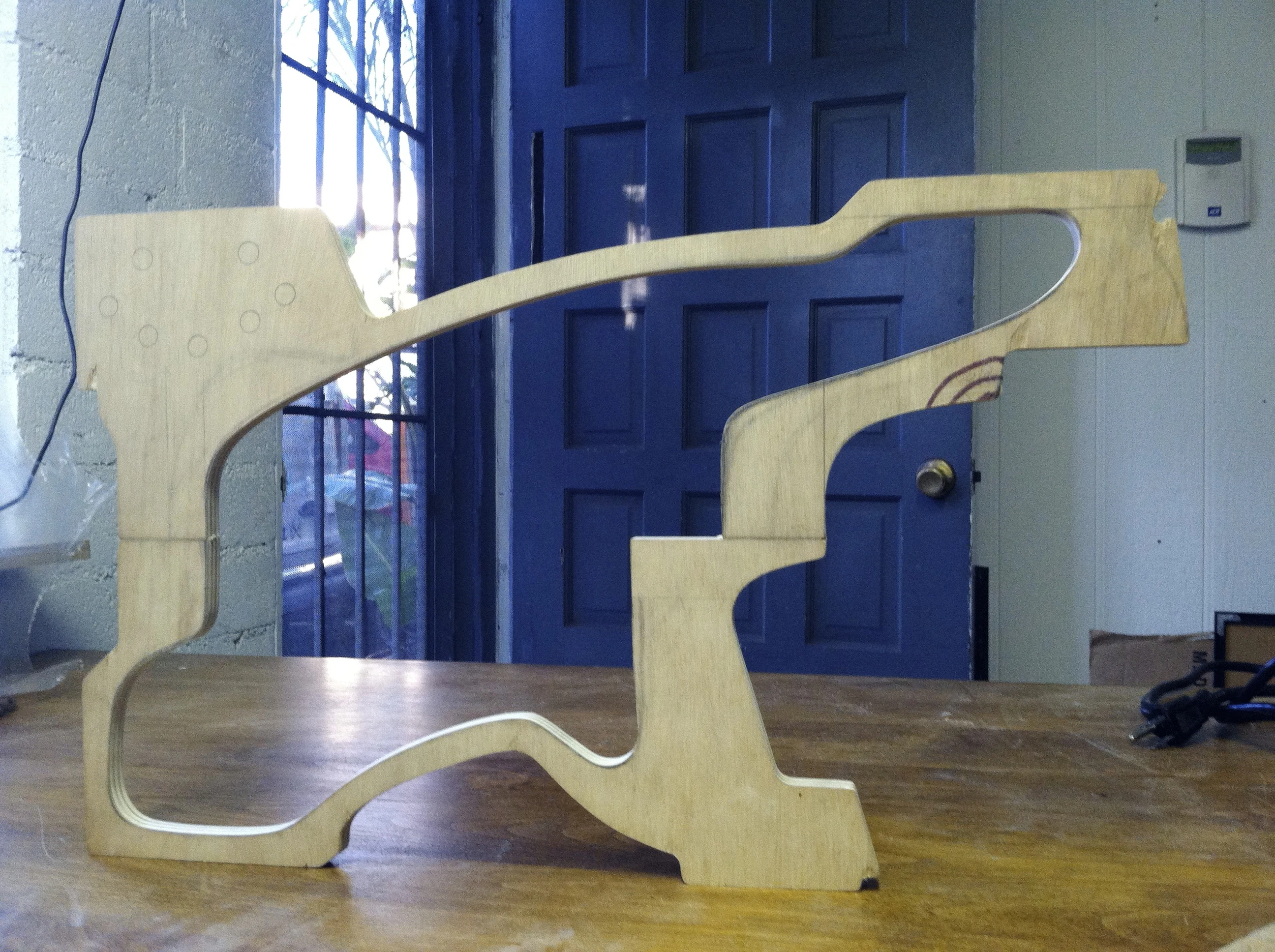 The wooden core of a hollow-bodied kitar prototype in the Jack style