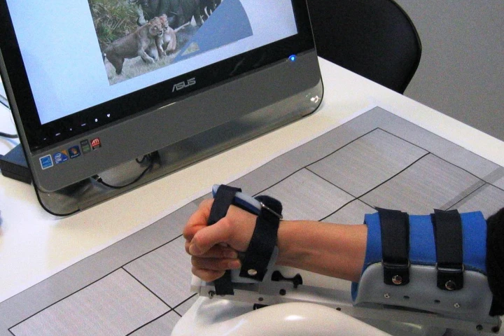 The ArmAssist system is designed to help stroke victims regain the use of their arms by playing custom video games