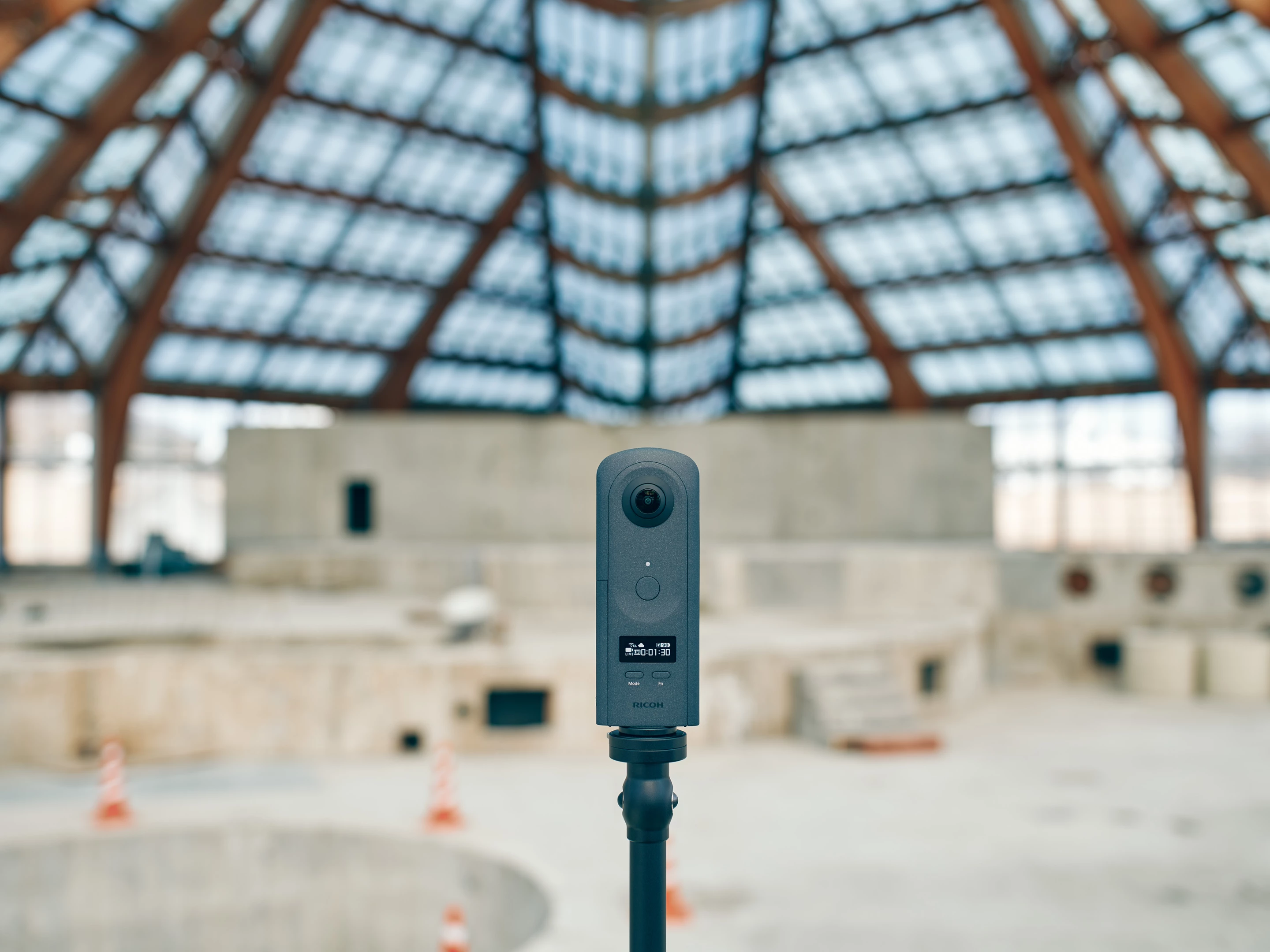 The Theta A1 sports a wide-angle lens on each side of its rugged housing for 360-degree photos and videos