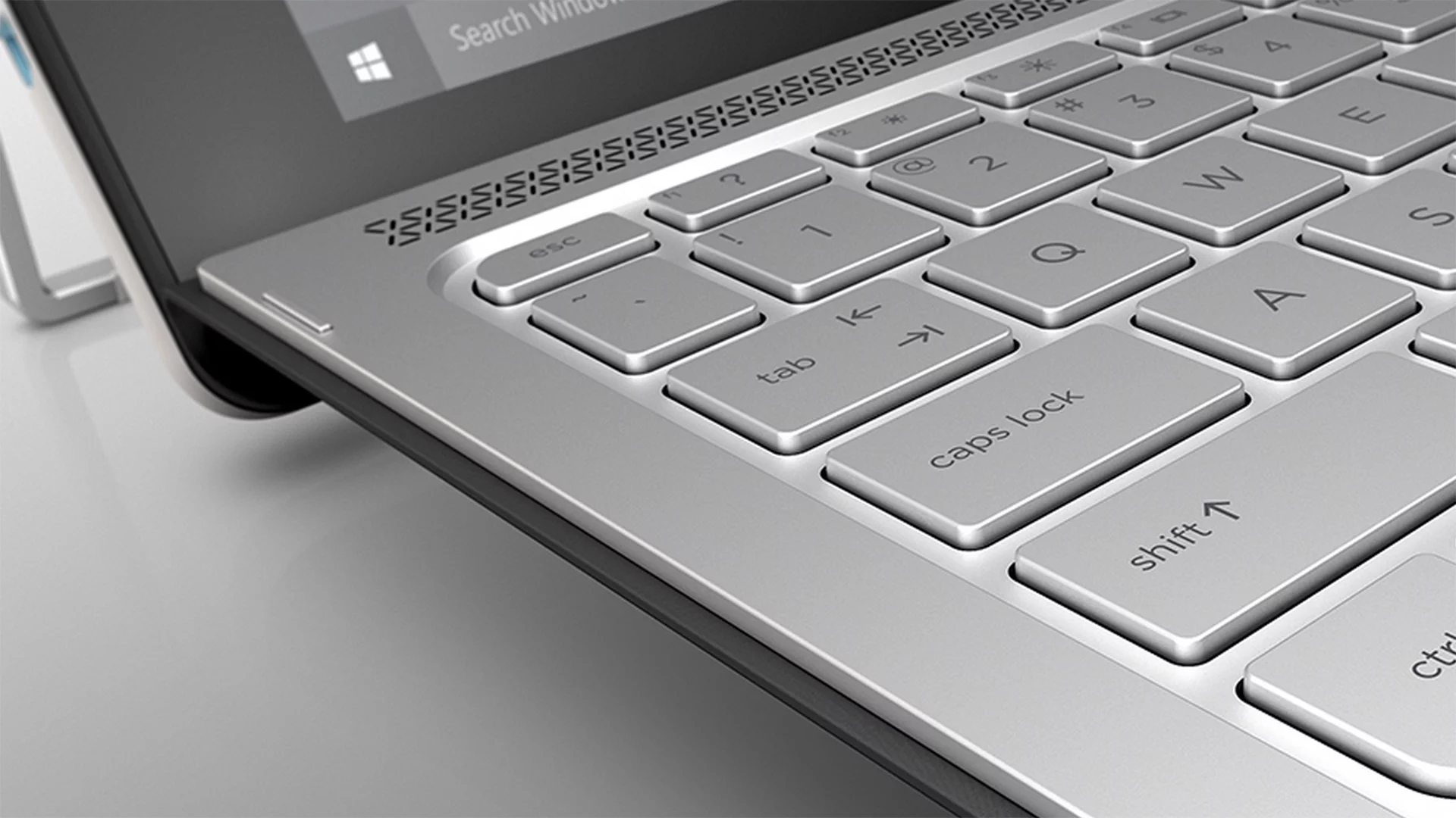 There are a couple of extra high-end features here in the form of backlighting behind the keys and four Bang and Olufsen speakers – two on the tablet and two on the keyboard