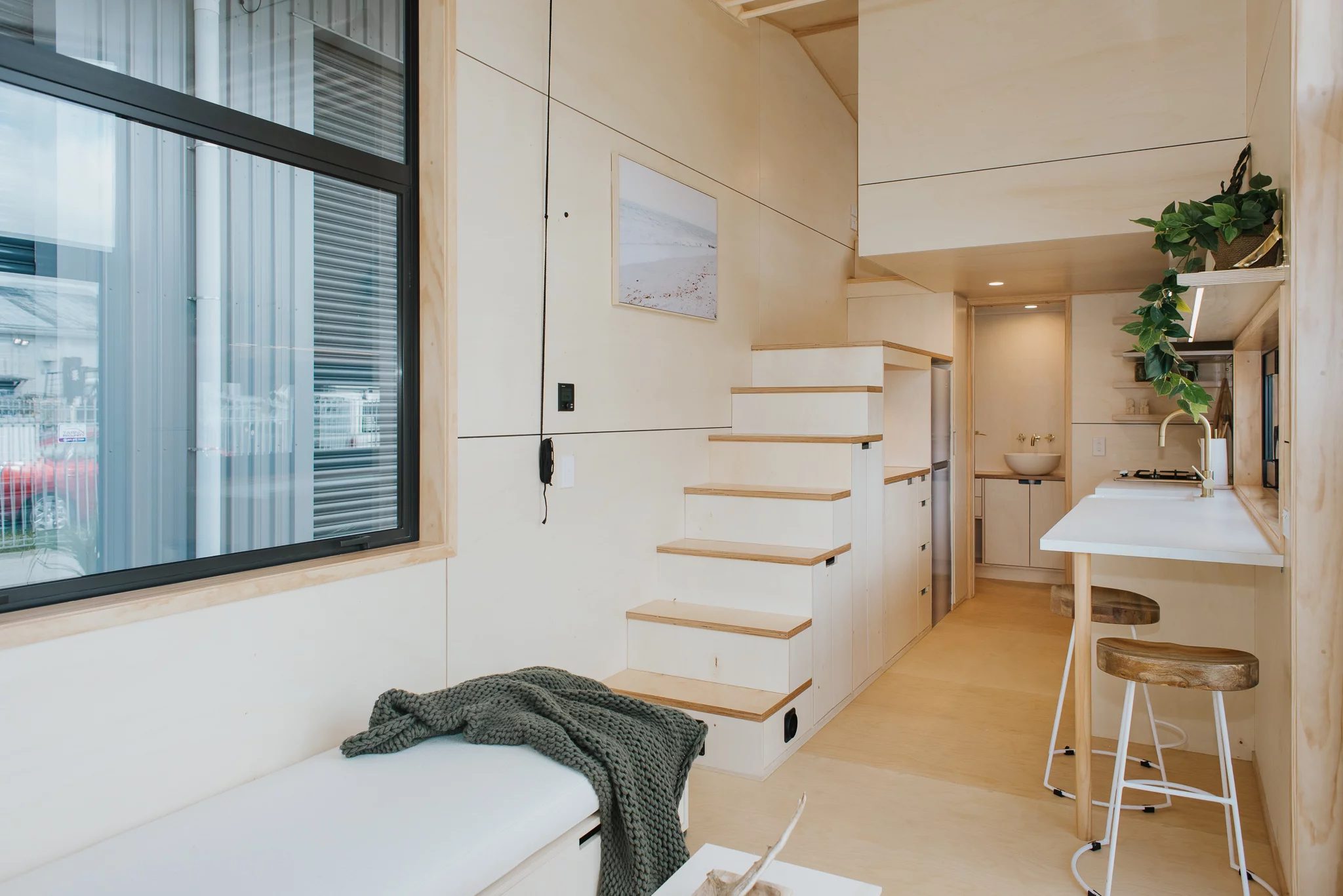 The Hilltop Tiny House's interior is finished in poplar core plywood
