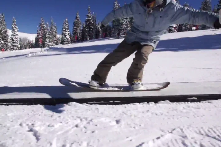 Hitting a box on one of the cardboard snowboard prototypes