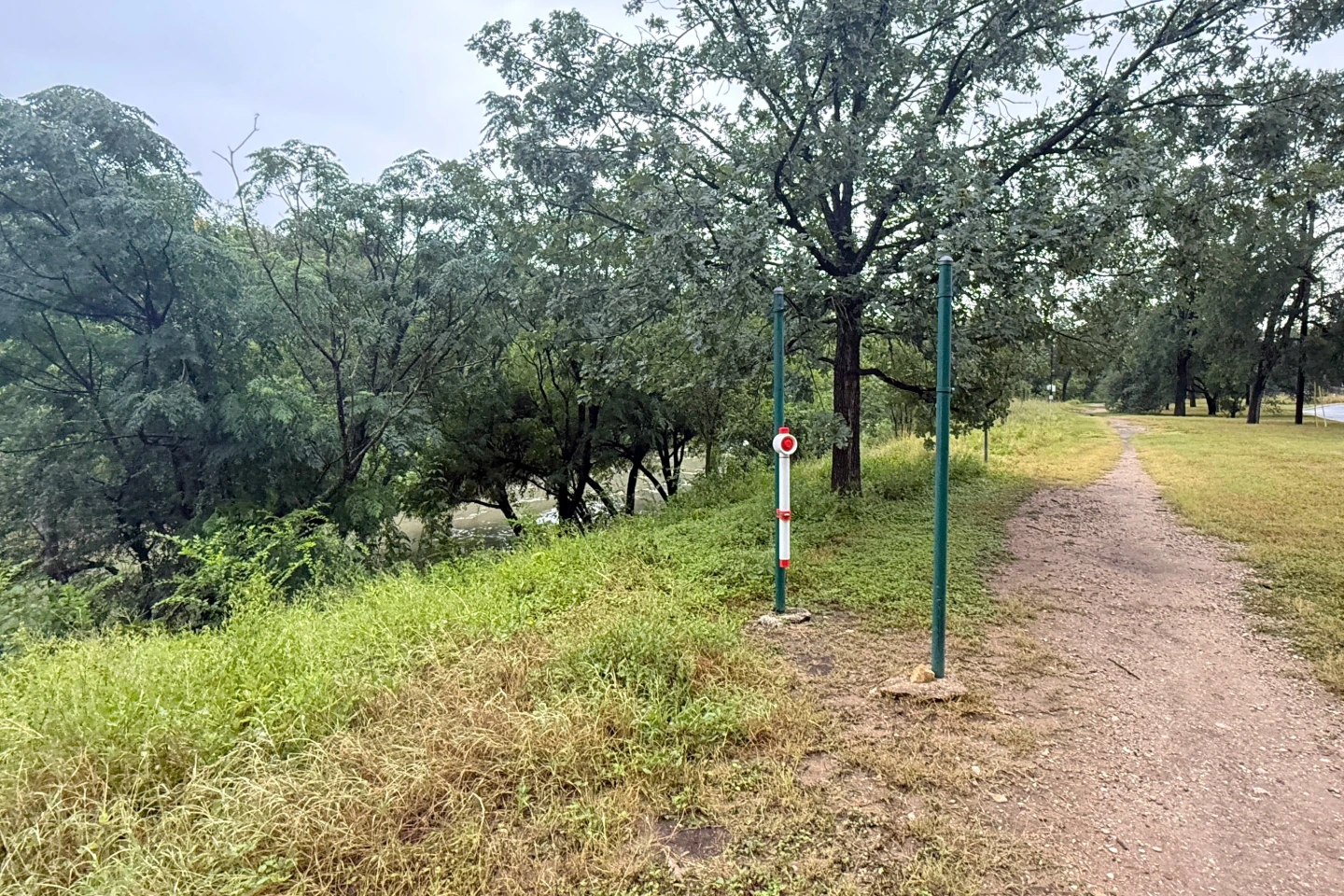 The device is pictured here mounted on a pole near Shoal Creek in Austin, Texas