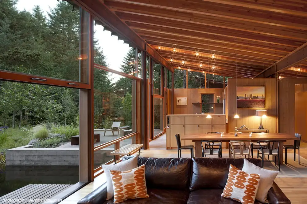 The interior of Newberg Residence includes a kitchen, living/dining room and master bedroom