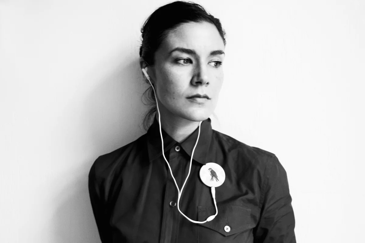 The Playbutton format puts an album release inside a button badge, with a 3.5mm earphone jack at the bottom and MP3player controls to the rear