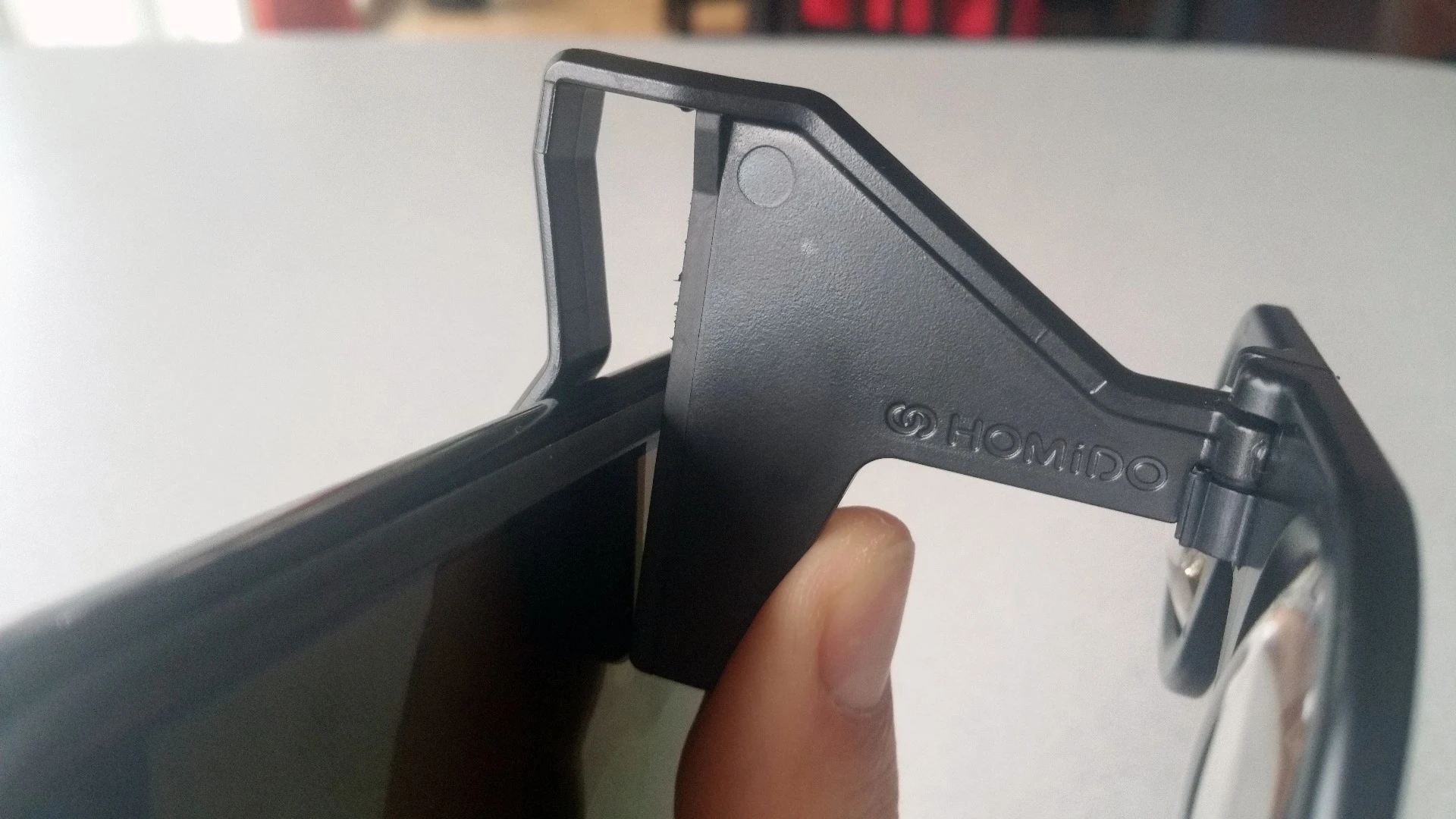 The Homido Mini clips to smartphones, though too much friction starts to wear the rubber