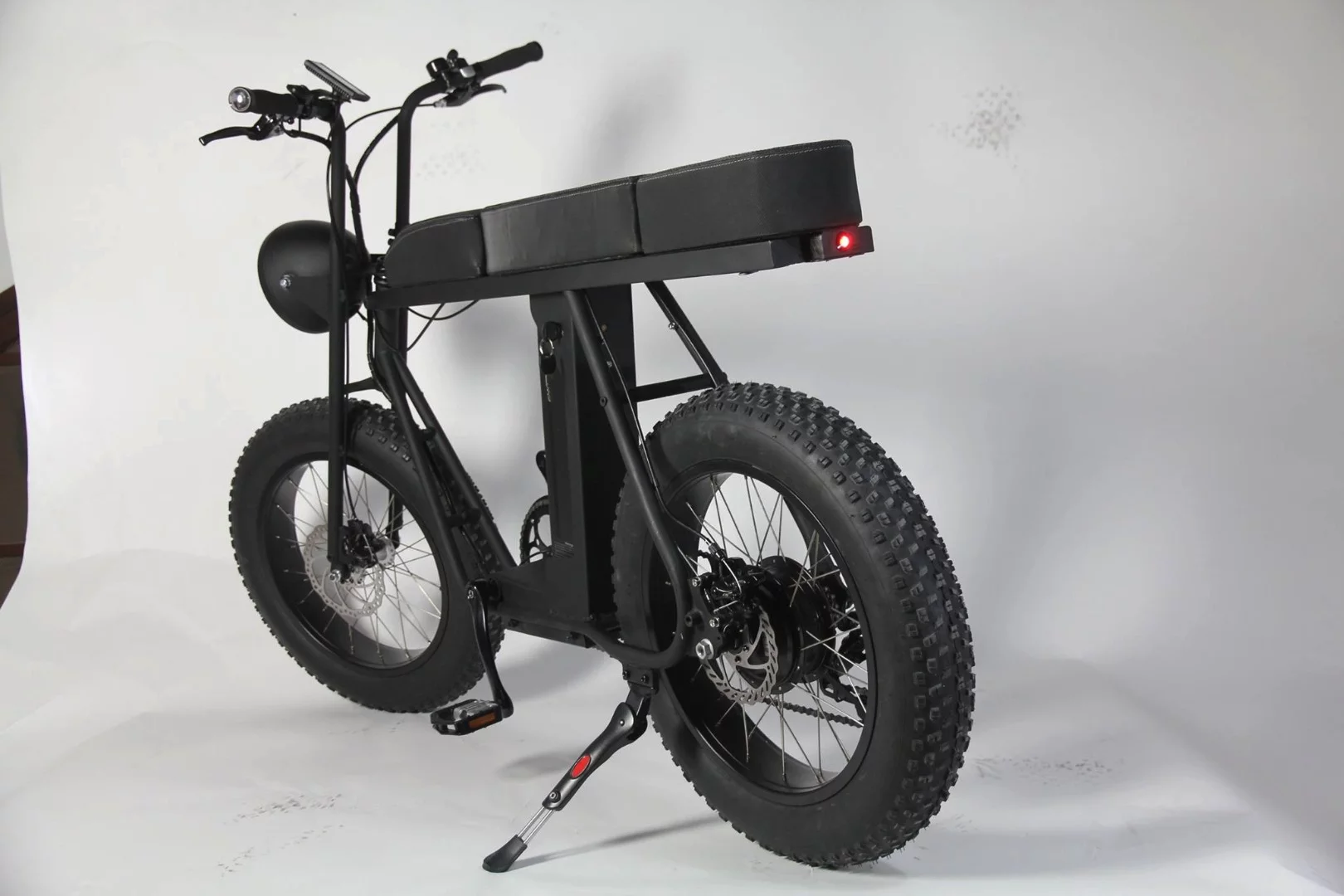 Urban Drivestyle says you can fit two adults or an adult and two children