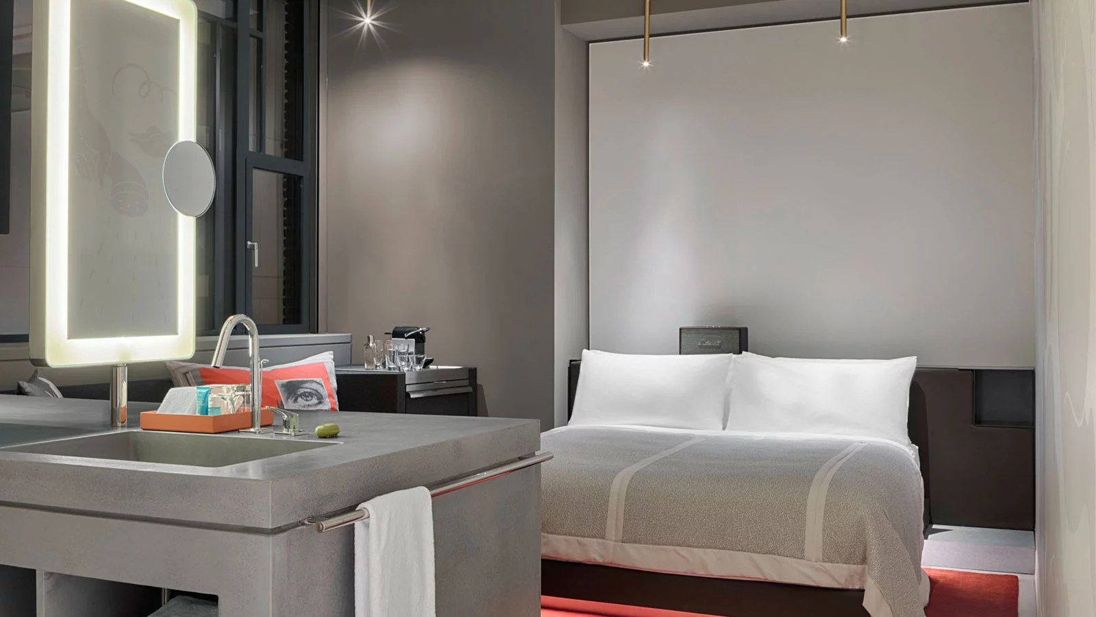 W Amsterdam houses 238 rooms across two of the city's "iconic" old buildings