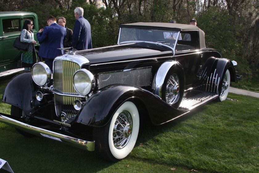 The Best in Show Concours d'Elegance Trophy was presented to a 1929 Duesenberg J/SJ Convertible