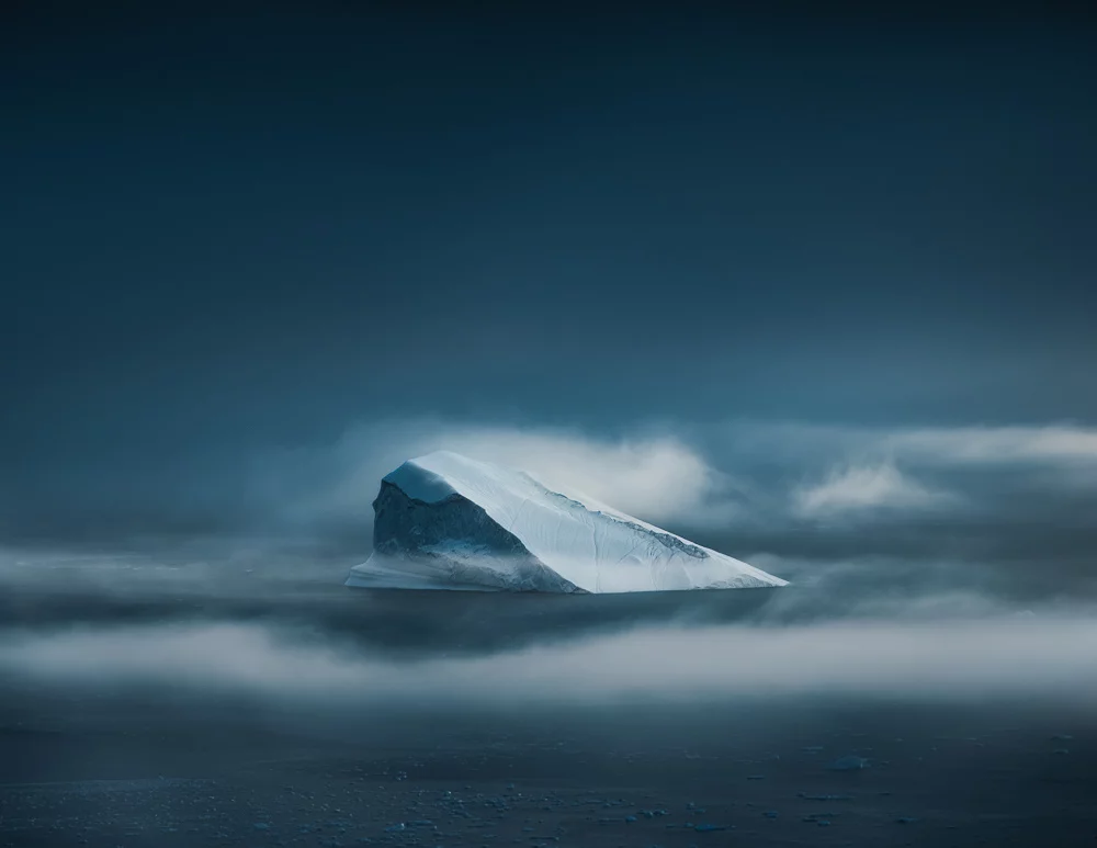 Hegen describes these icebergs as, "breaking through the fog like giant white castles"