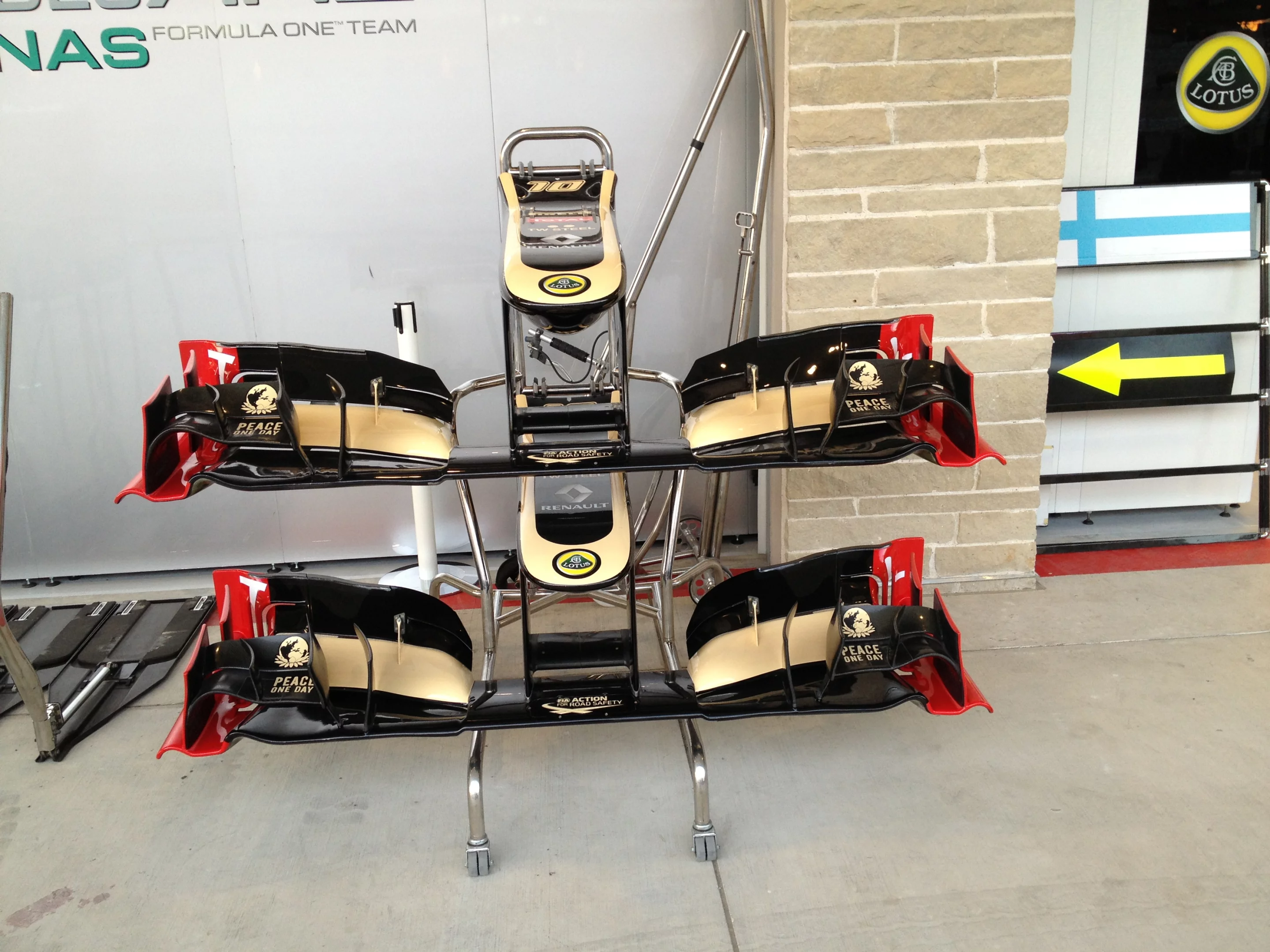 Formula 1 cars use aerodynamic surfaces to keep the cars glued to the track in the corners. These are some front wings from Team Lotus