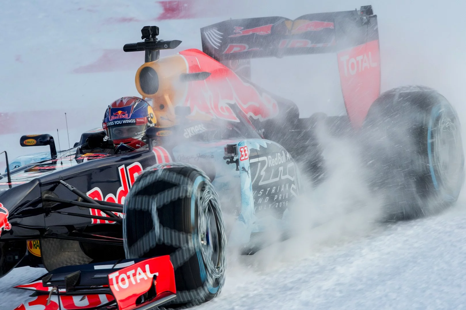 Verstappen spits up snow as he pilots the RB7